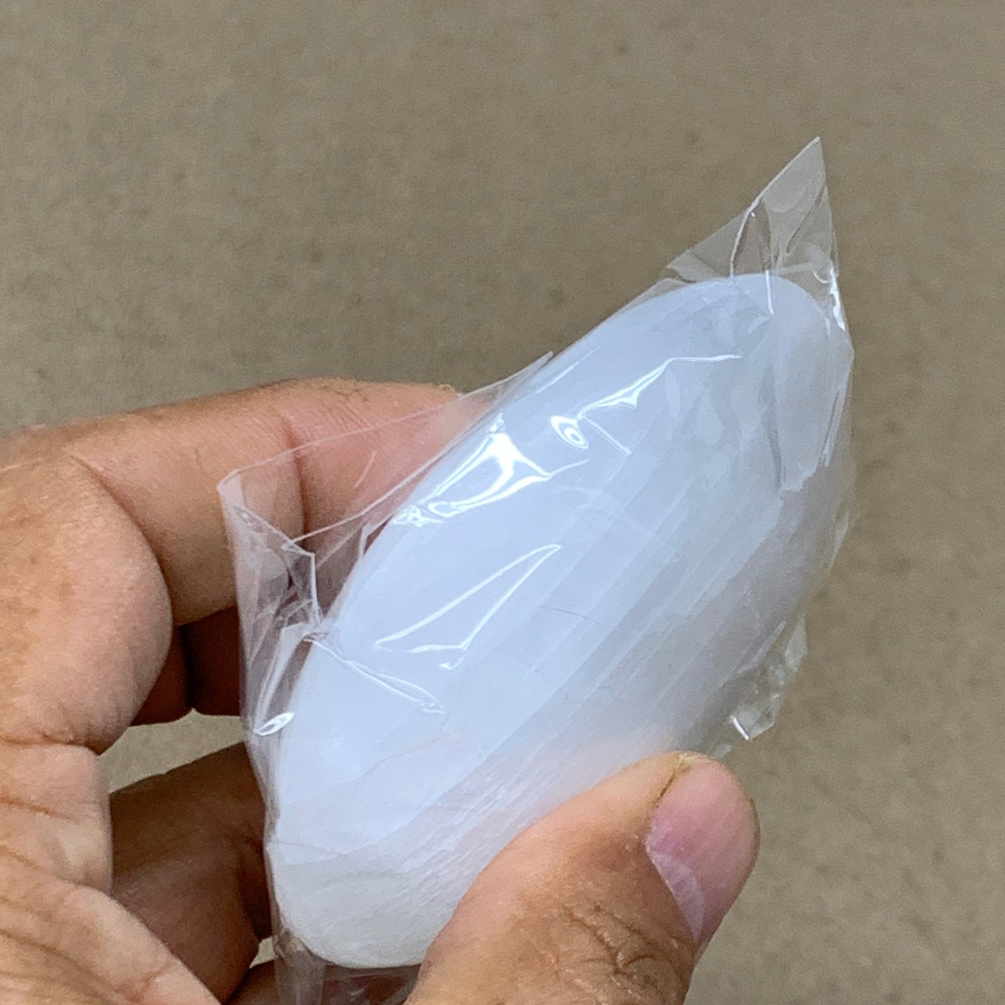 88g, 2.7"x1.9"x0.9", White Selenite Palmstone Crystal Pillow Reiki, B36421