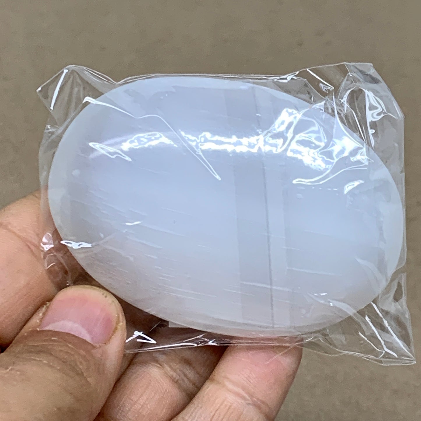 88g, 2.7"x1.9"x0.9", White Selenite Palmstone Crystal Pillow Reiki, B36423