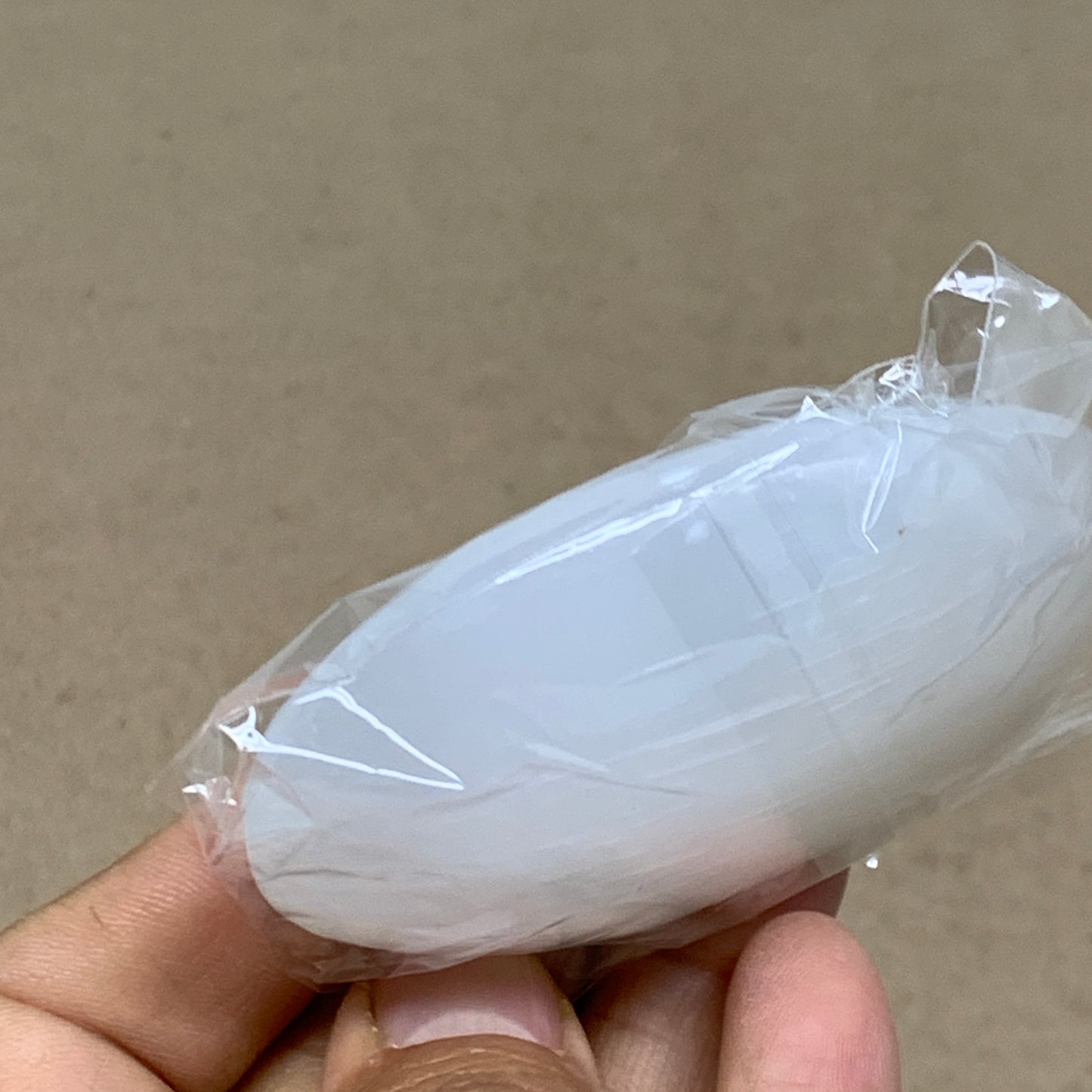 88g, 2.7"x1.9"x0.9", White Selenite Palmstone Crystal Pillow Reiki, B36423