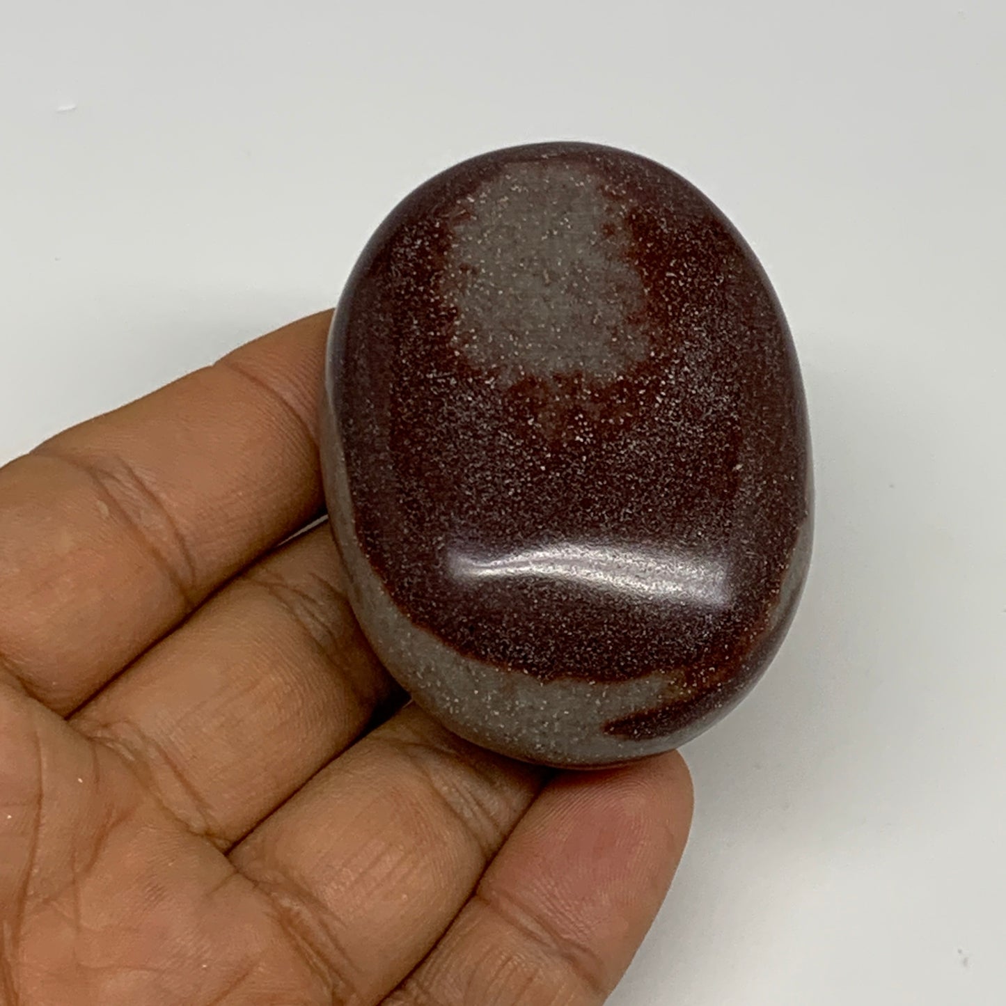 91.2g, 2.3"x1.7"x0.9", Narmada Shiva Lingam Palm-Stone Polished, B29380