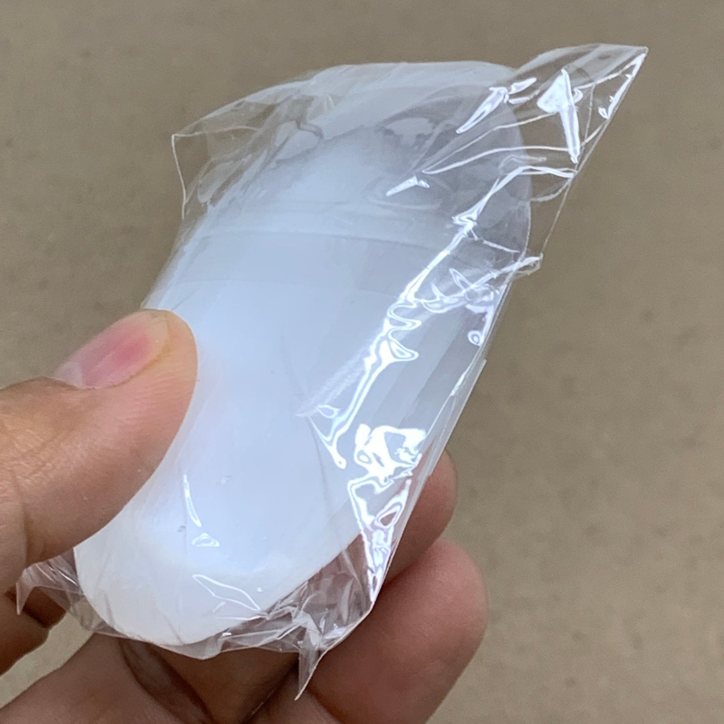 88g, 2.7"x1.9"x0.9", White Selenite Palmstone Crystal Pillow Reiki, B36423