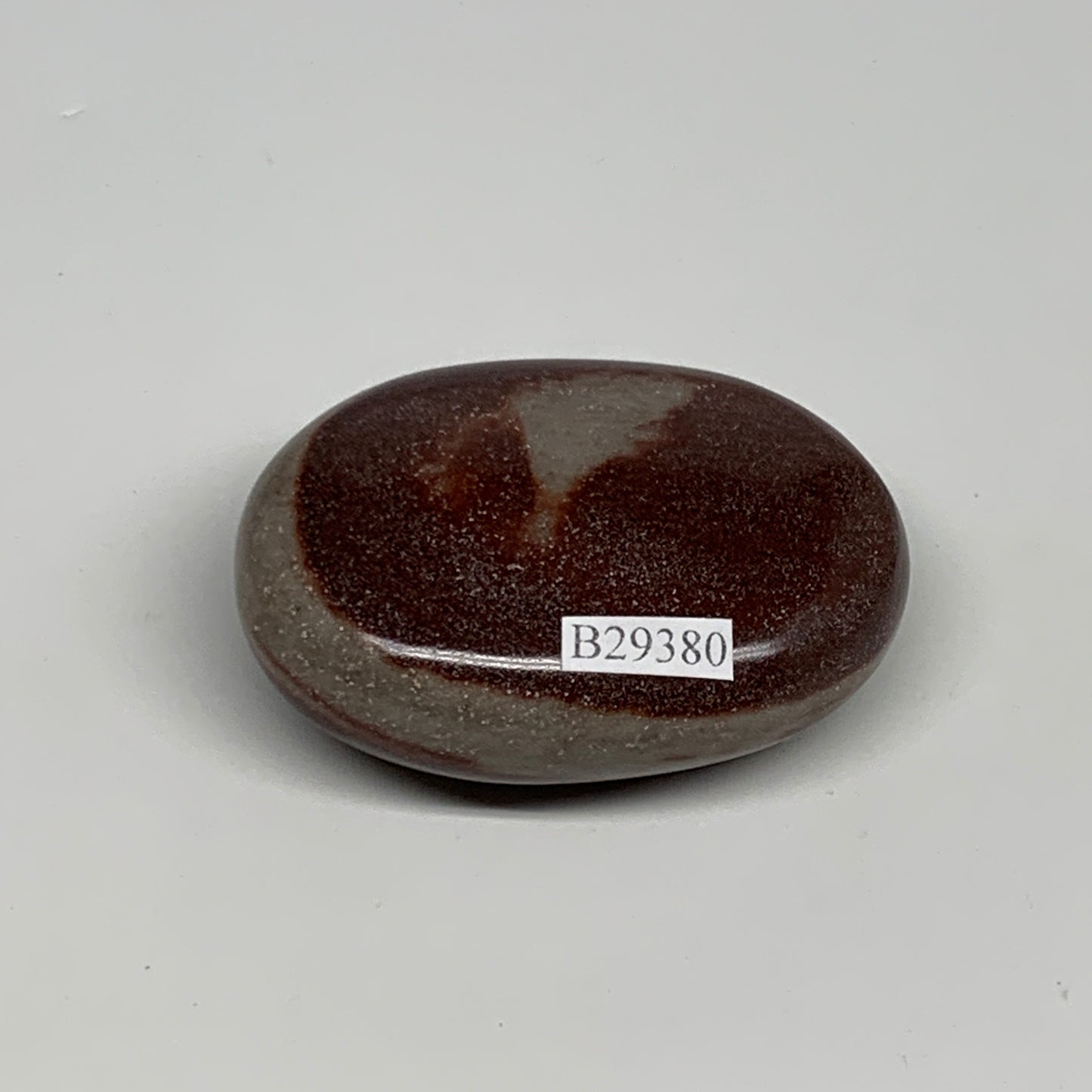 91.2g, 2.3"x1.7"x0.9", Narmada Shiva Lingam Palm-Stone Polished, B29380