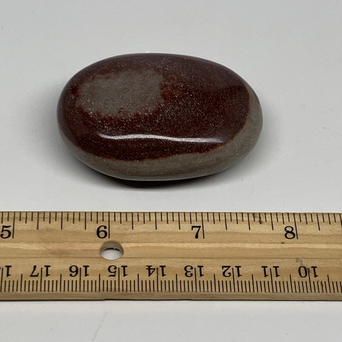 91.2g, 2.3"x1.7"x0.9", Narmada Shiva Lingam Palm-Stone Polished, B29380