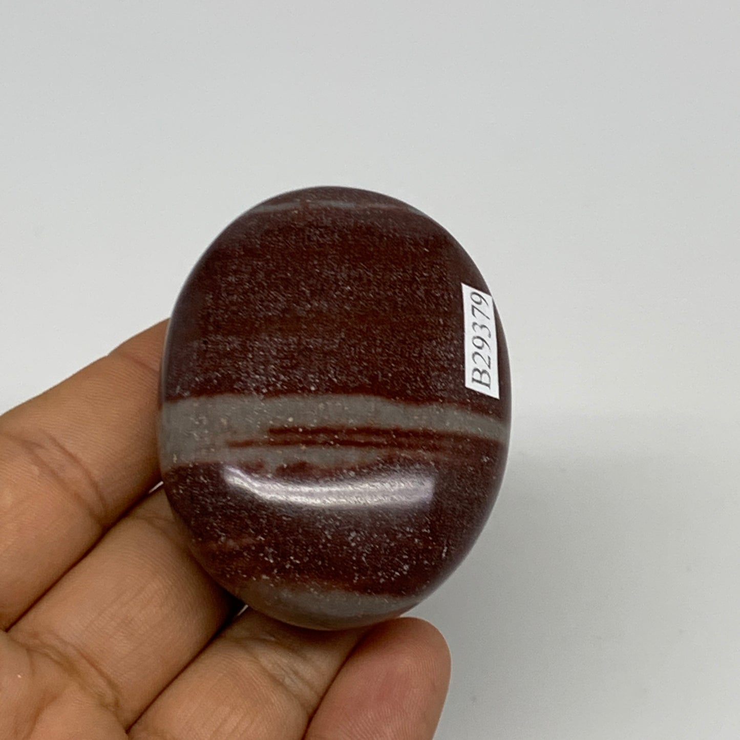 97.4g, 2.3"x1.7"x1", Narmada Shiva Lingam Palm-Stone Polished, B29379