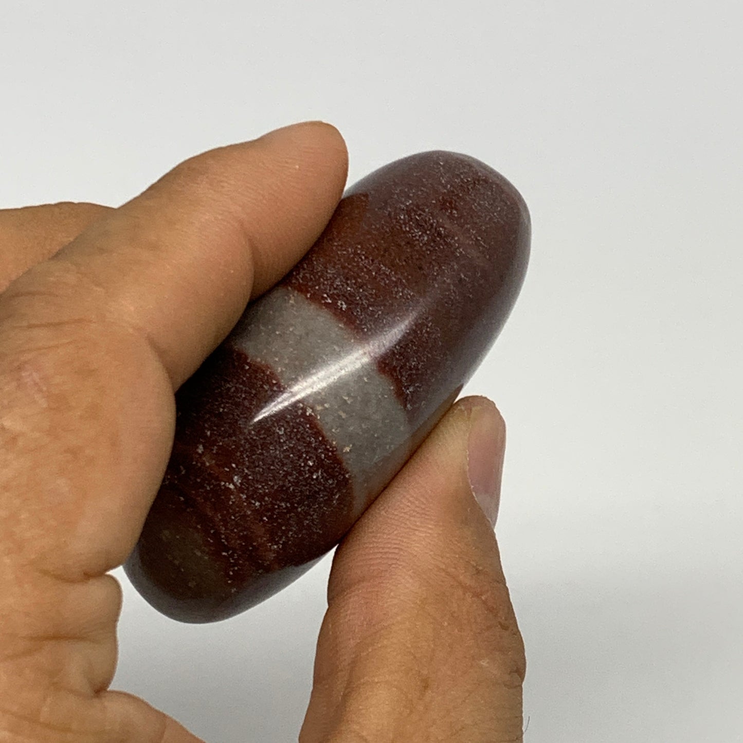 97.4g, 2.3"x1.7"x1", Narmada Shiva Lingam Palm-Stone Polished, B29379