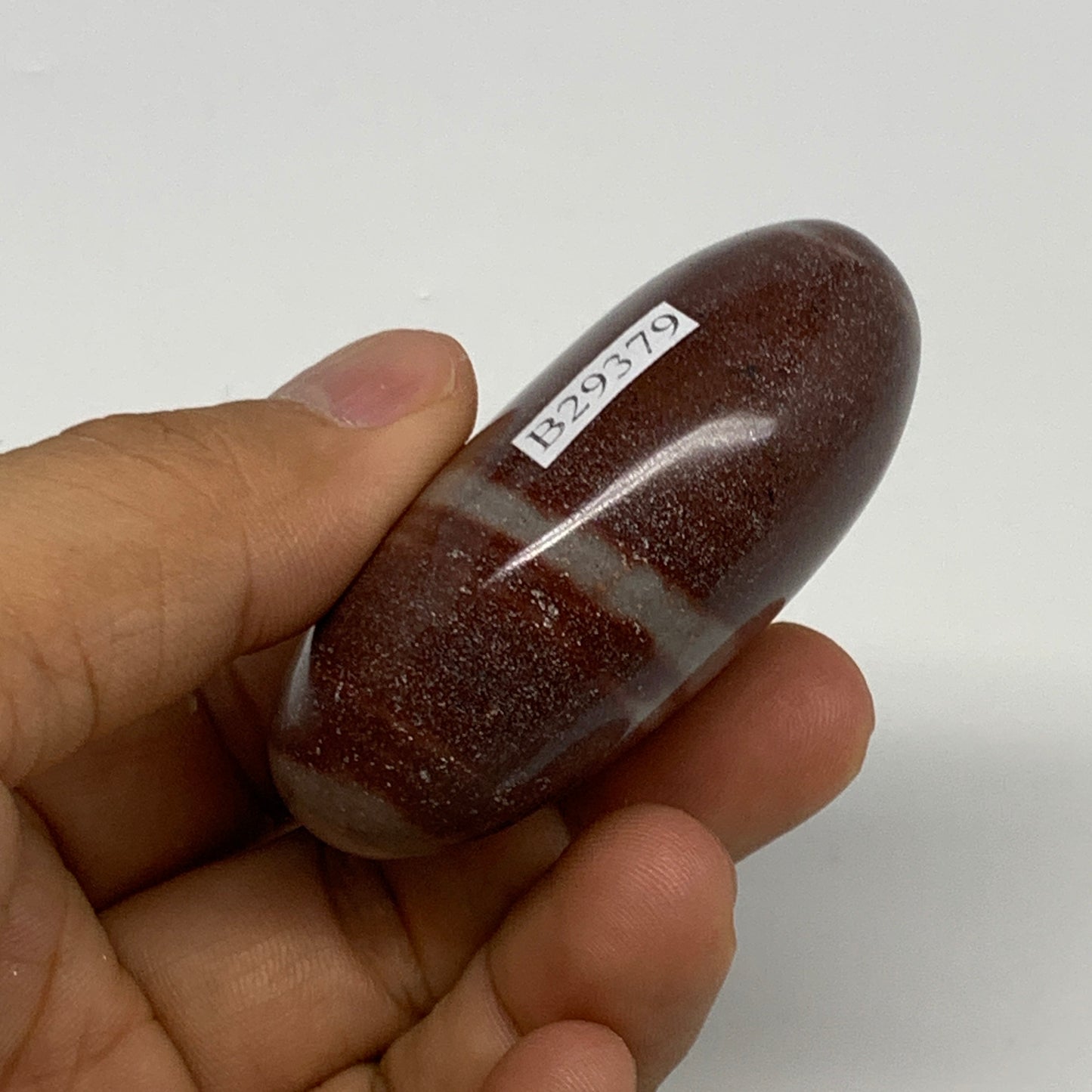 97.4g, 2.3"x1.7"x1", Narmada Shiva Lingam Palm-Stone Polished, B29379