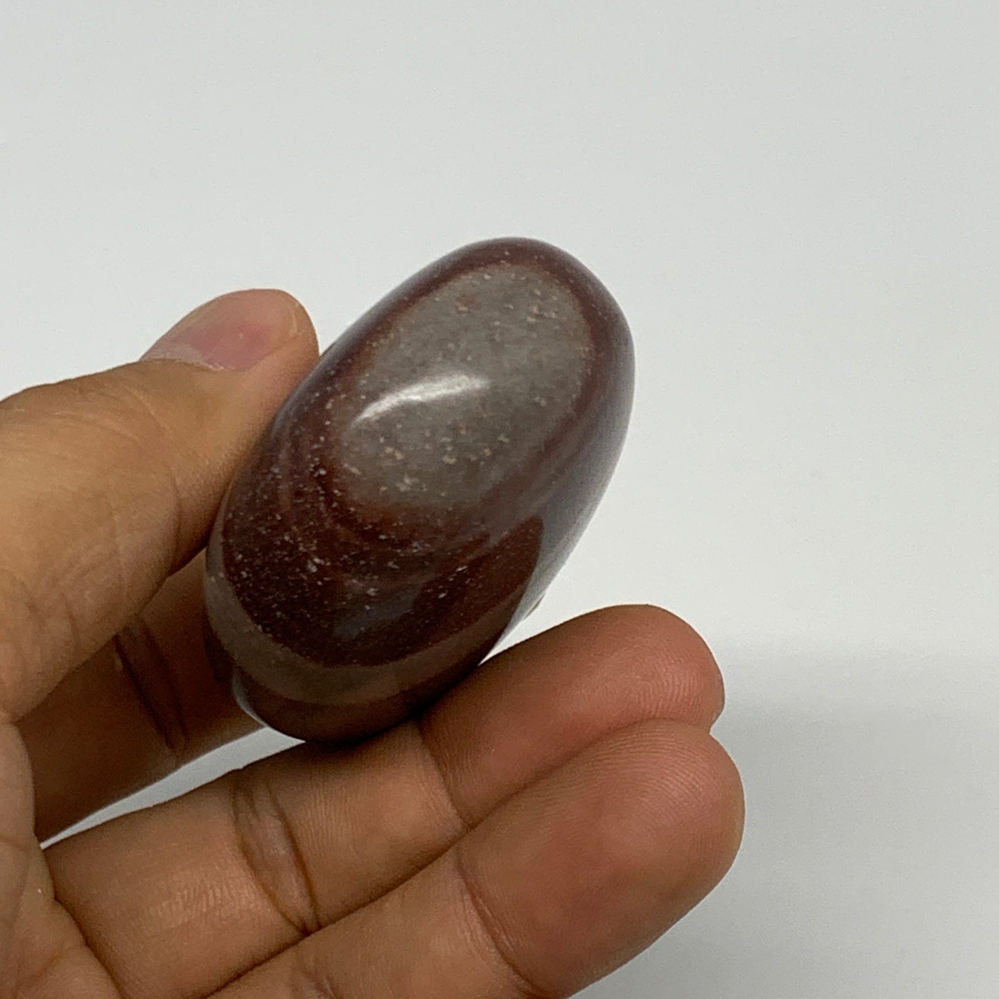 97.4g, 2.3"x1.7"x1", Narmada Shiva Lingam Palm-Stone Polished, B29379