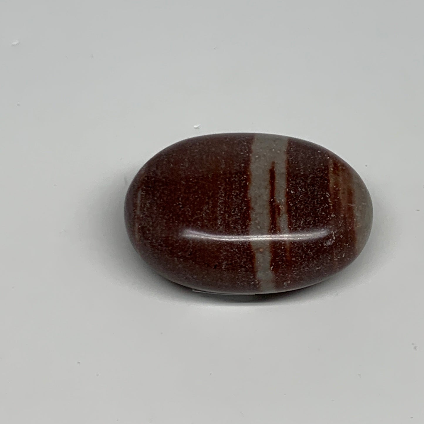 97.4g, 2.3"x1.7"x1", Narmada Shiva Lingam Palm-Stone Polished, B29379