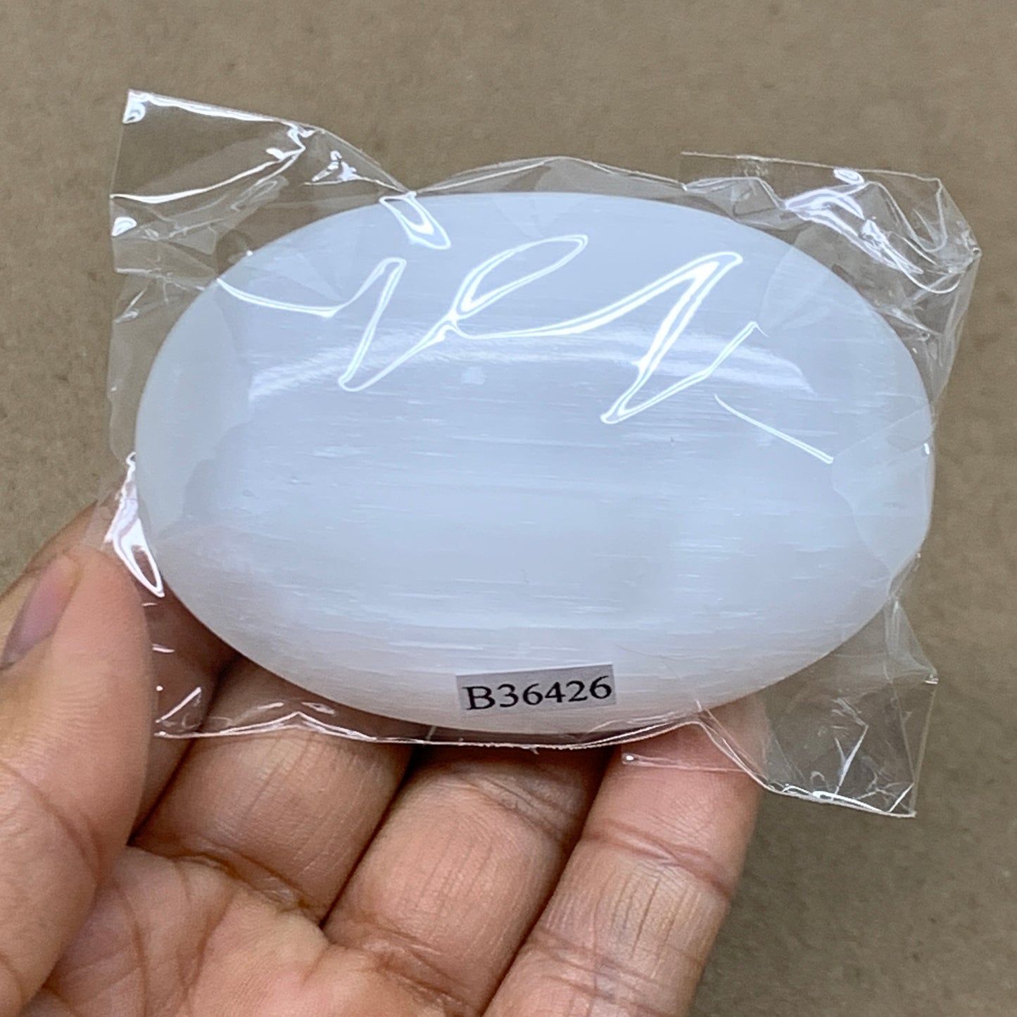 95g, 2.8"x1.9"x0.9", White Selenite Palmstone Crystal Pillow Reiki, B36426