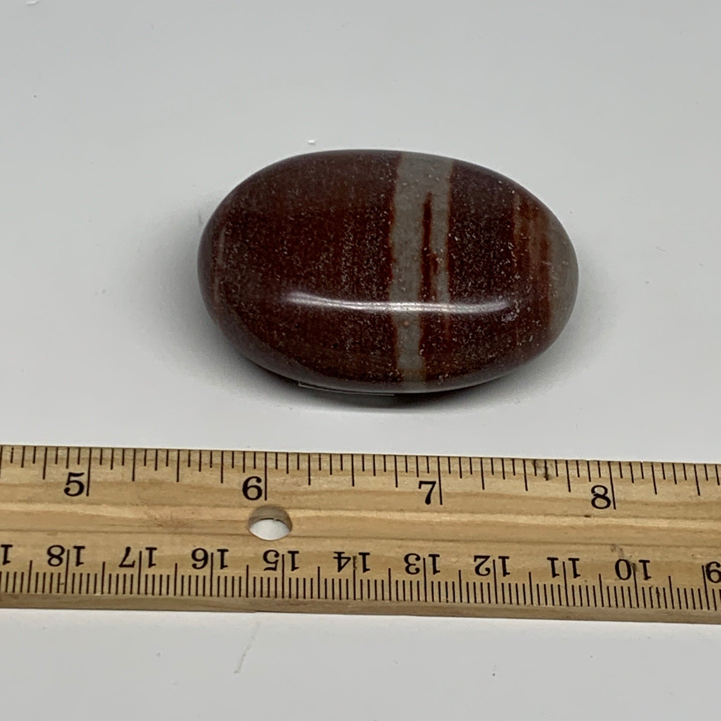 97.4g, 2.3"x1.7"x1", Narmada Shiva Lingam Palm-Stone Polished, B29379