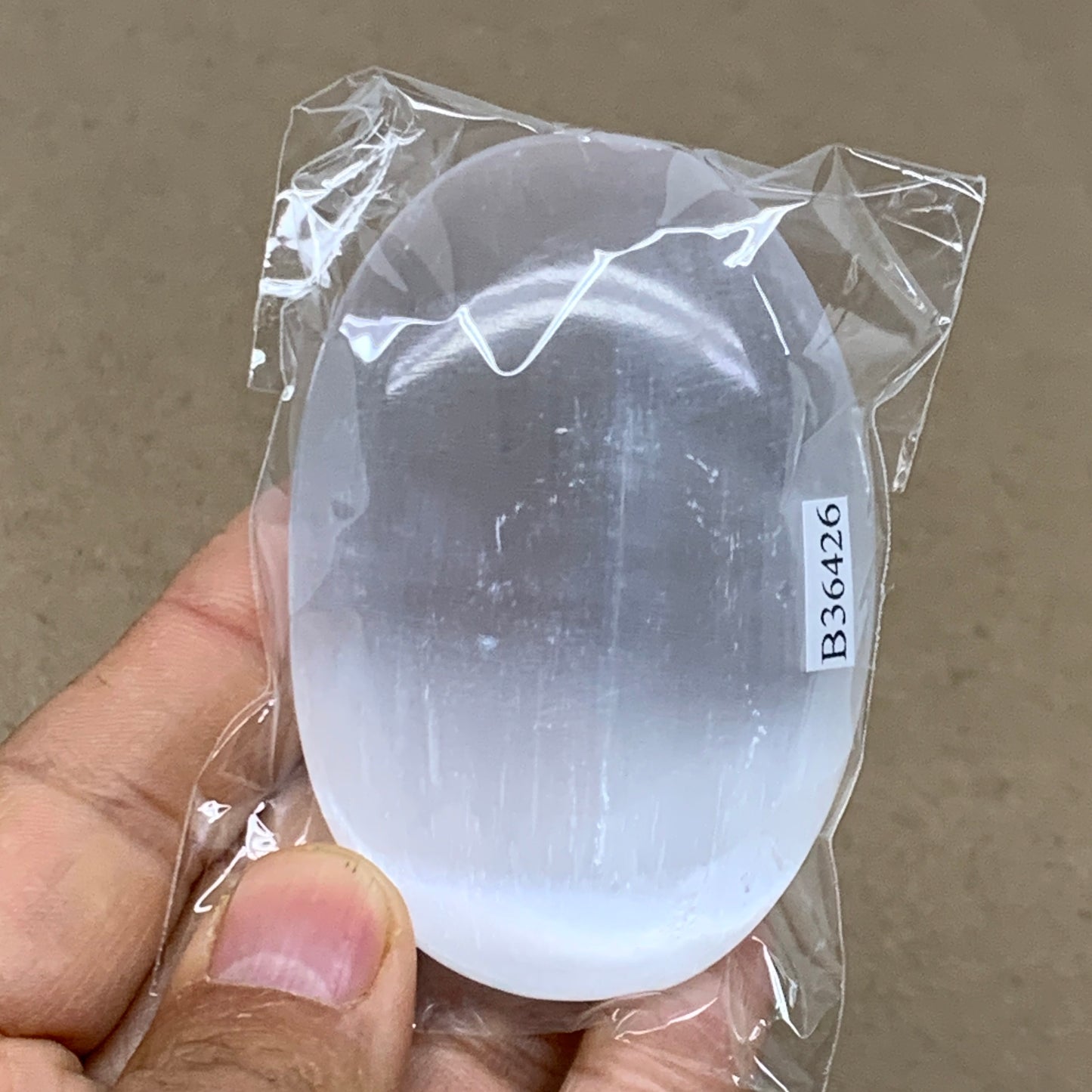 95g, 2.8"x1.9"x0.9", White Selenite Palmstone Crystal Pillow Reiki, B36426