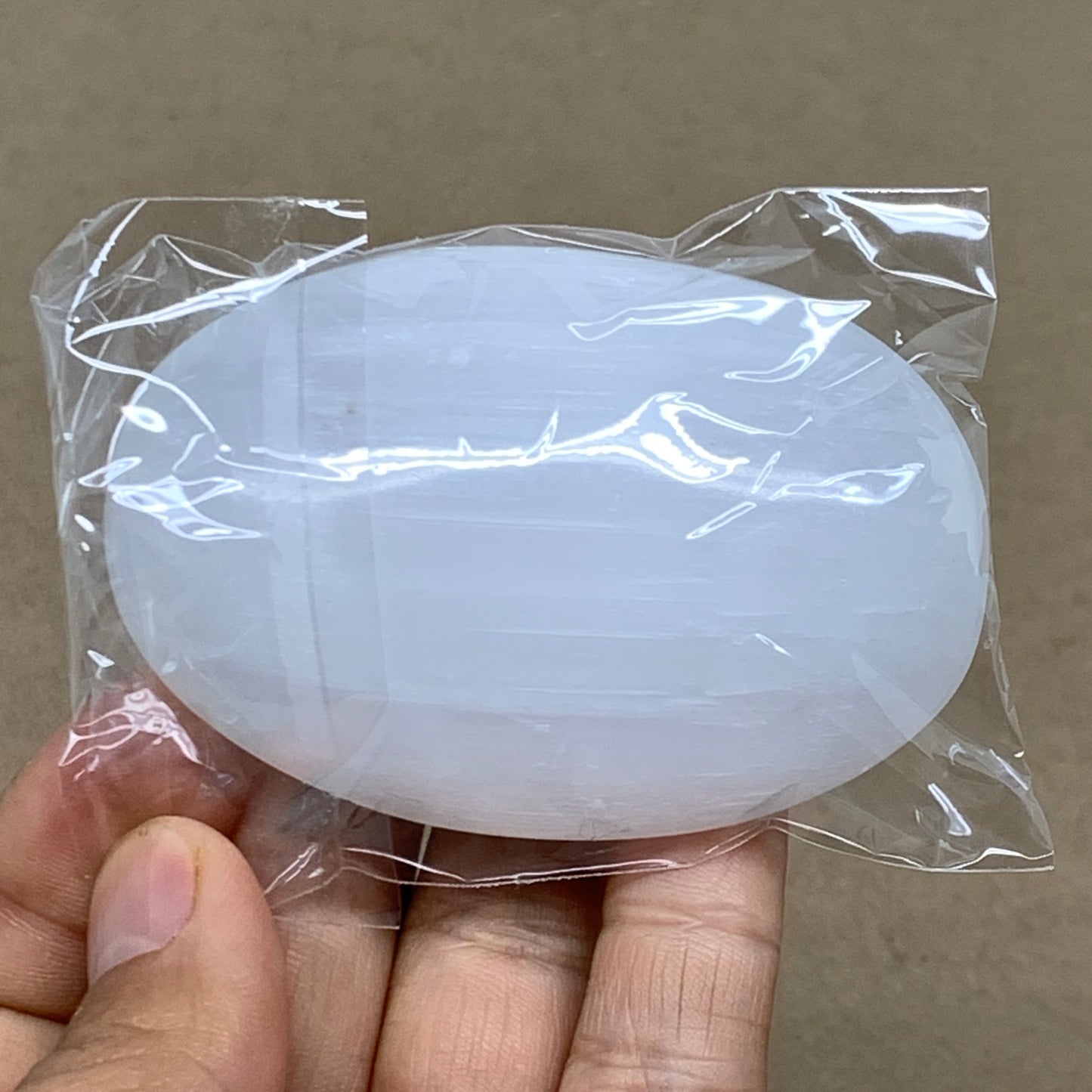 95g, 2.8"x1.9"x0.9", White Selenite Palmstone Crystal Pillow Reiki, B36426