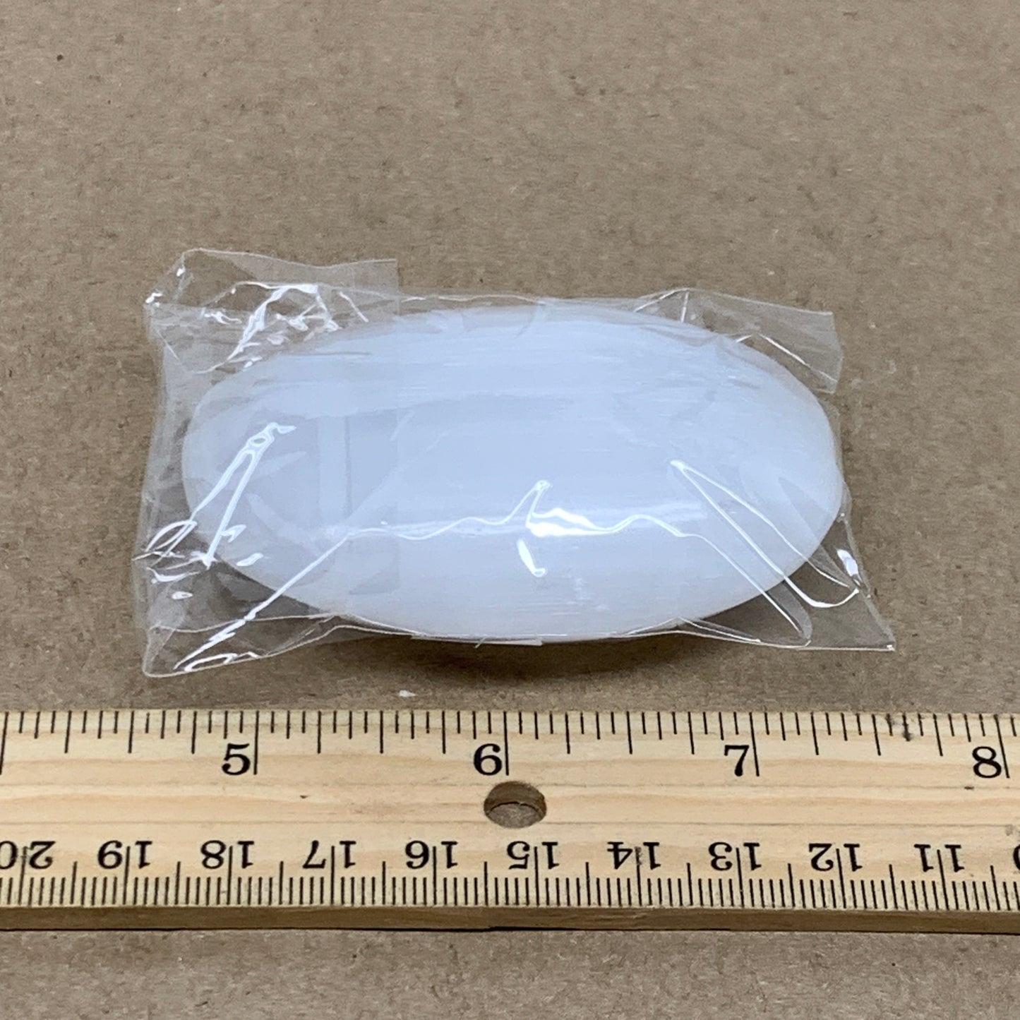 95g, 2.8"x1.9"x0.9", White Selenite Palmstone Crystal Pillow Reiki, B36426