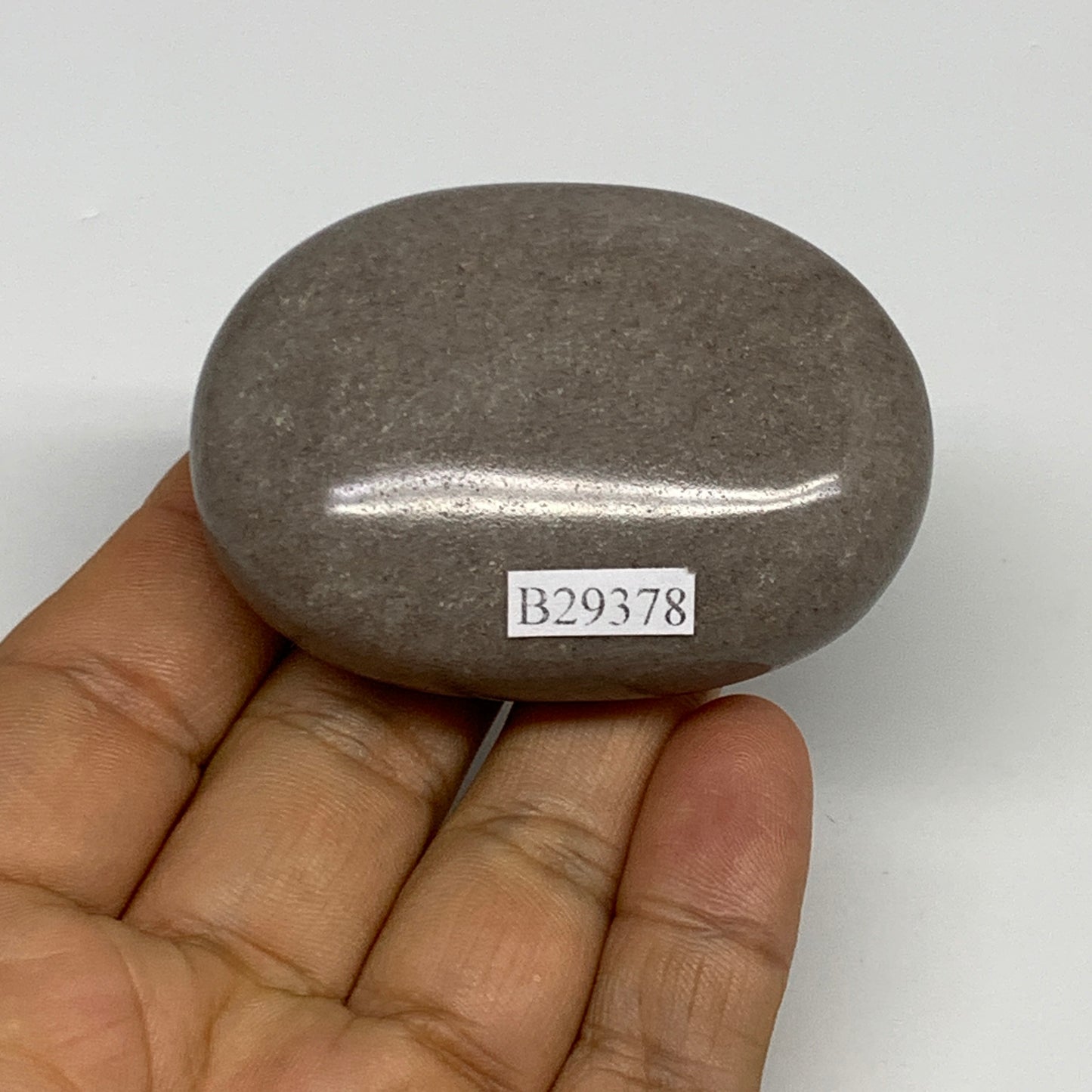 94.9g, 2.4"x1.7"x0.9", Narmada Shiva Lingam Palm-Stone Polished, B29378