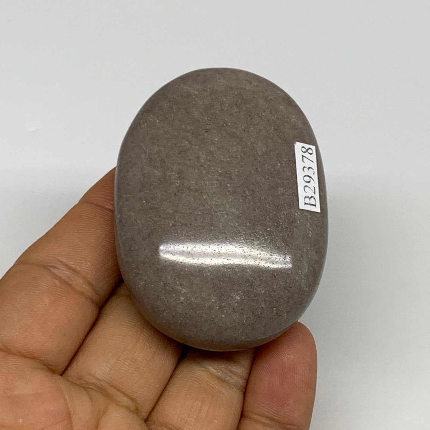 94.9g, 2.4"x1.7"x0.9", Narmada Shiva Lingam Palm-Stone Polished, B29378