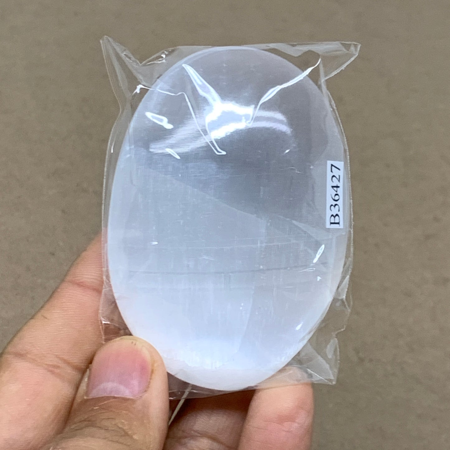 97g, 2.8"x2"x0.9", White Selenite Palmstone Crystal Pillow Reiki, B36427