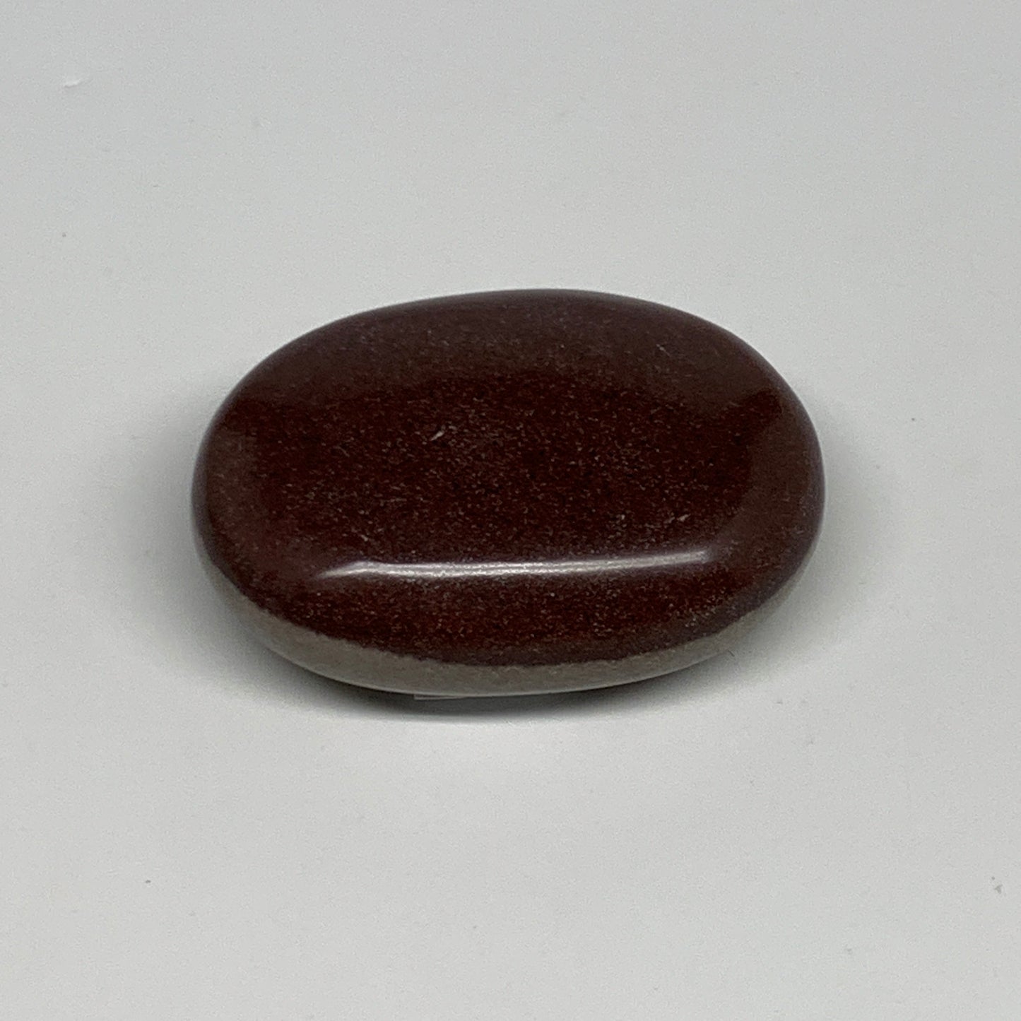 94.9g, 2.4"x1.7"x0.9", Narmada Shiva Lingam Palm-Stone Polished, B29378
