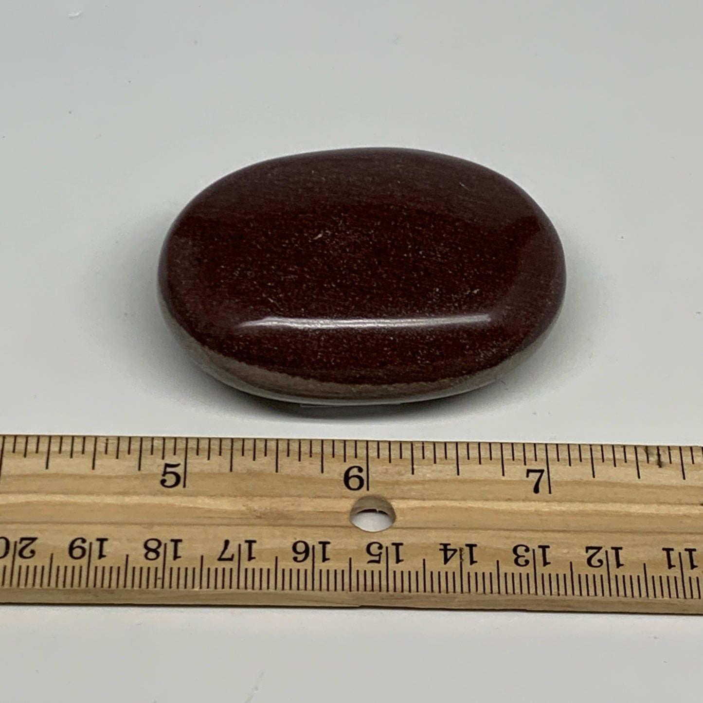 94.9g, 2.4"x1.7"x0.9", Narmada Shiva Lingam Palm-Stone Polished, B29378