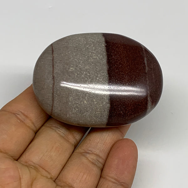 97.8g, 2.3"x1.7"x1", Narmada Shiva Lingam Palm-Stone Polished, B29376