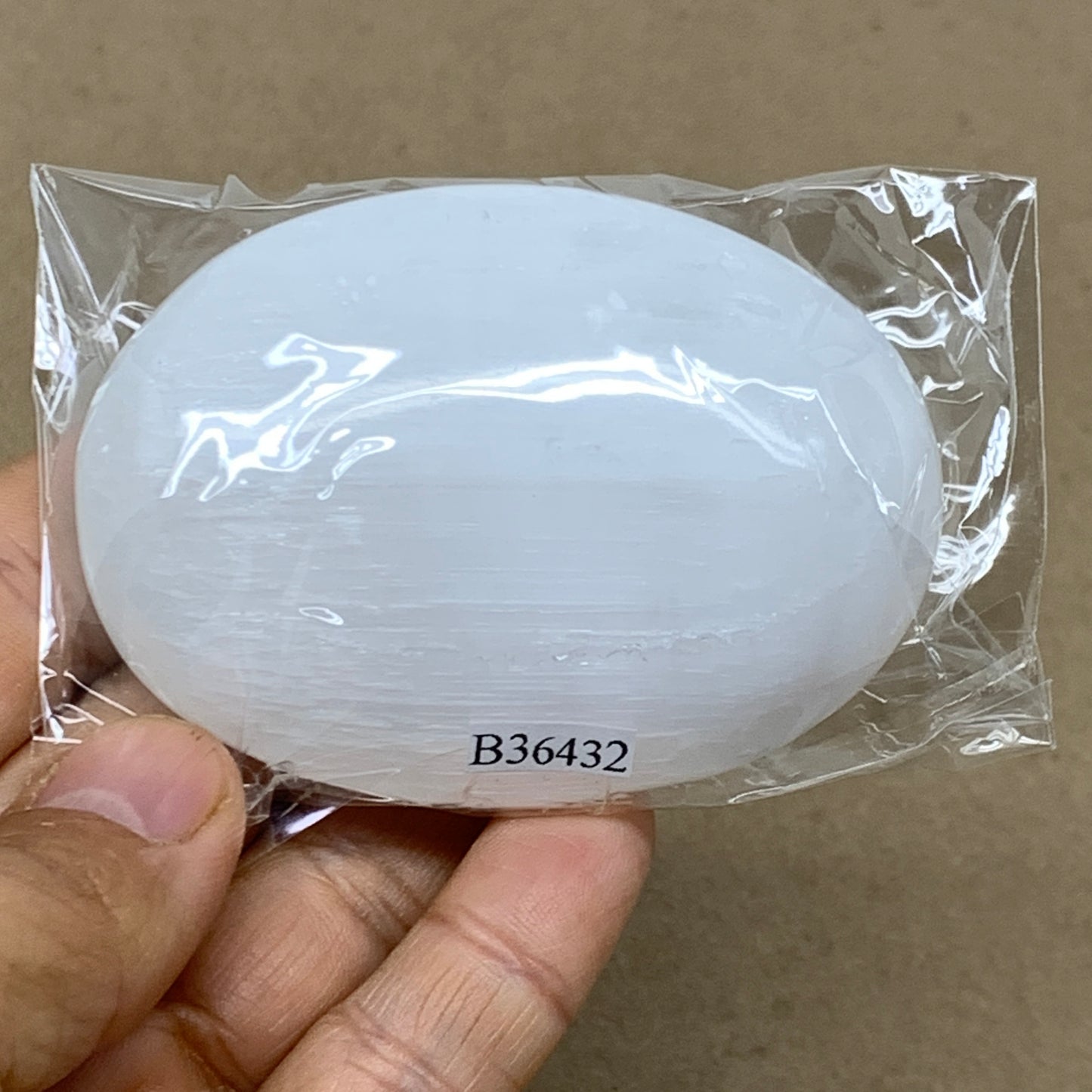 104g, 2.8"x2"x0.9", White Selenite Palmstone Crystal Pillow Reiki, B36432