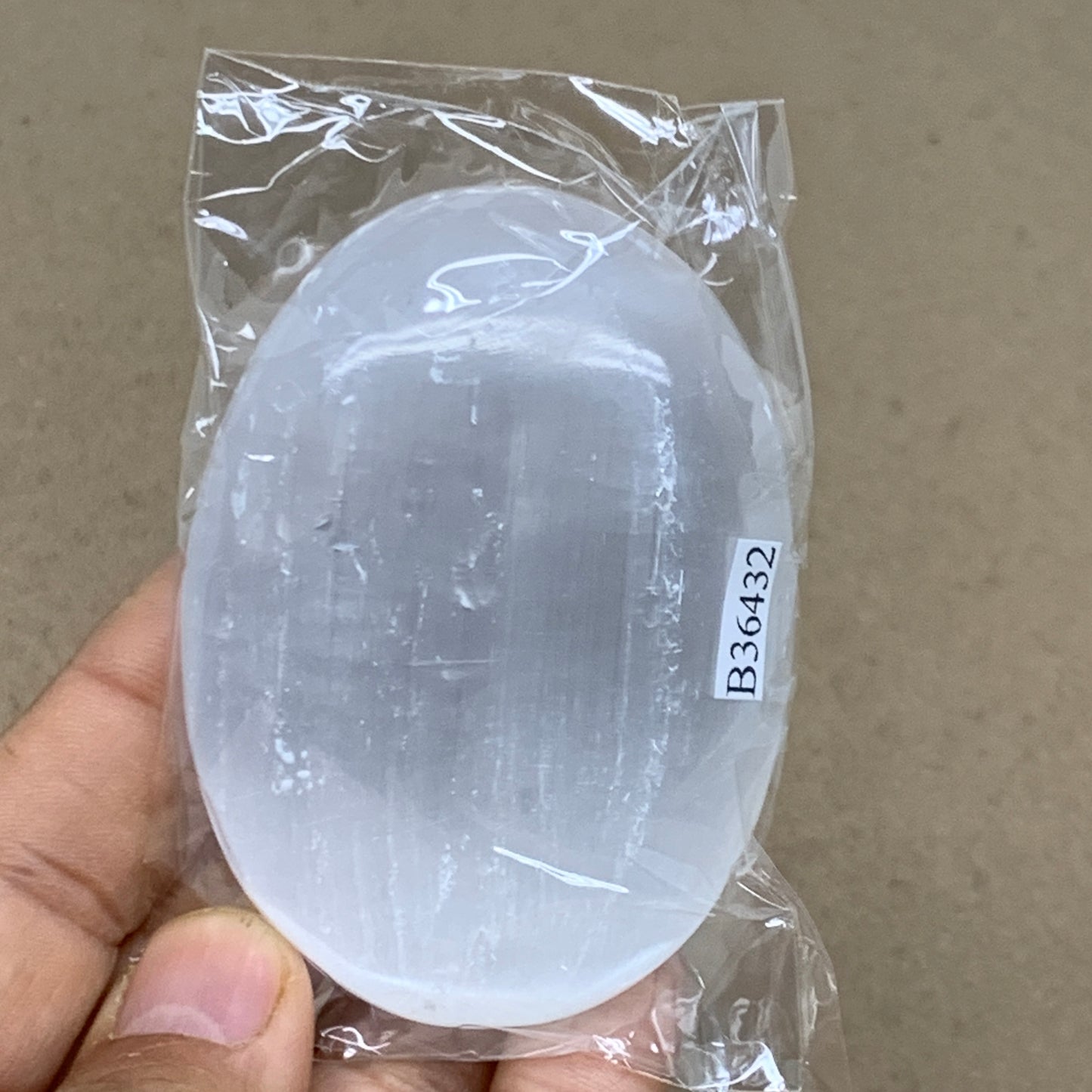 104g, 2.8"x2"x0.9", White Selenite Palmstone Crystal Pillow Reiki, B36432