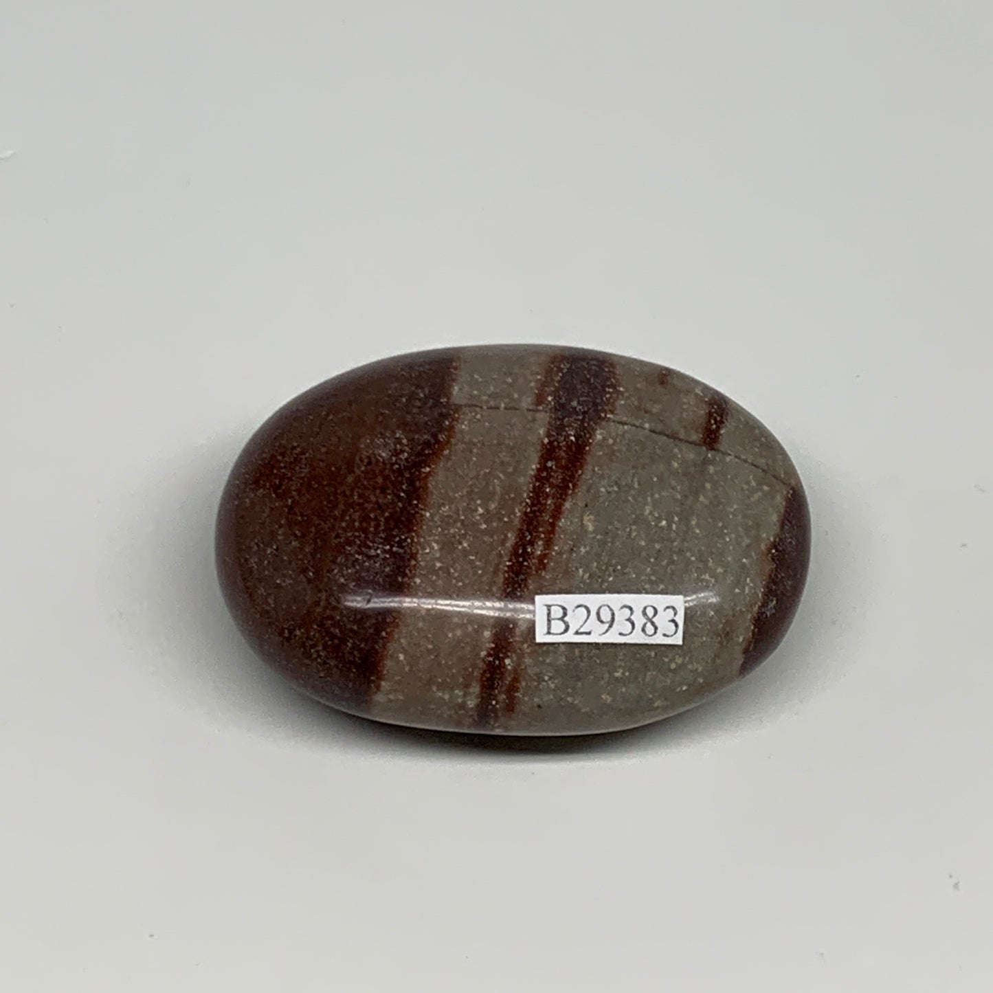 95.8g, 2.3"x1.7"x0.9", Narmada Shiva Lingam Palm-Stone Polished, B29383