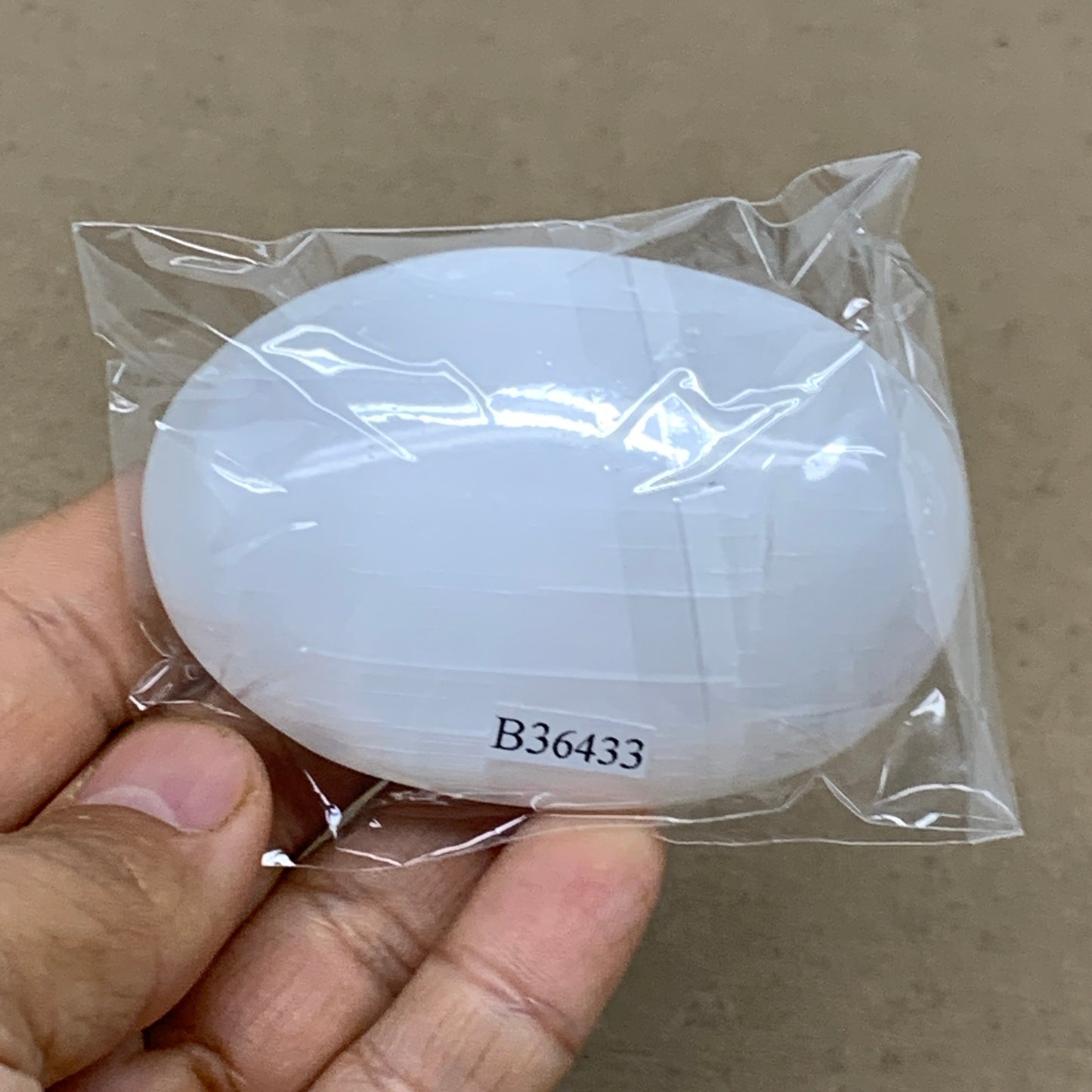 90g, 2.8"x1.9"x1", White Selenite Palmstone Crystal Pillow Reiki, B36433