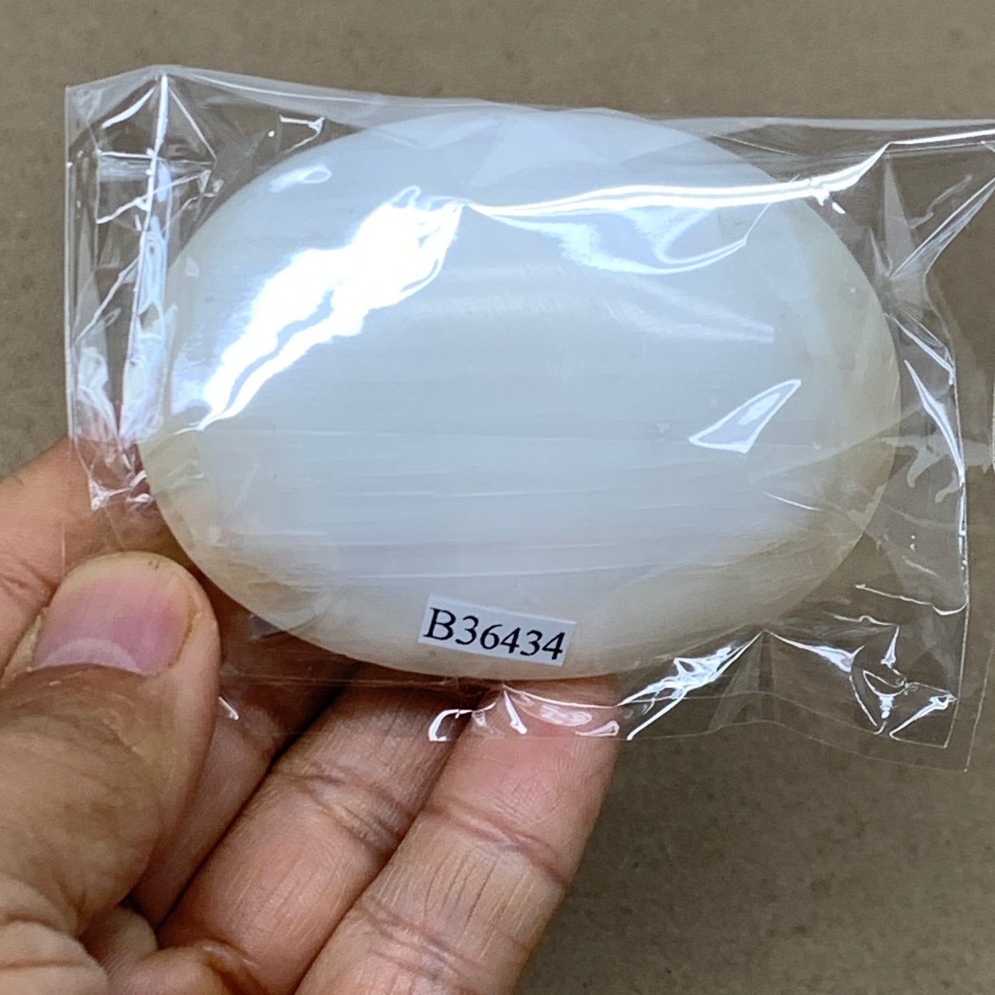 103g, 2.8"x2.1"x0.9", White Selenite Palmstone Crystal Pillow Reiki, B36434