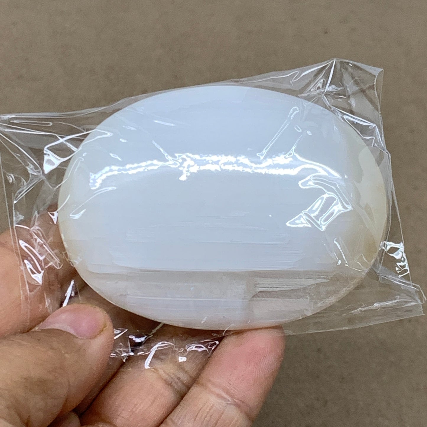 103g, 2.8"x2.1"x0.9", White Selenite Palmstone Crystal Pillow Reiki, B36434