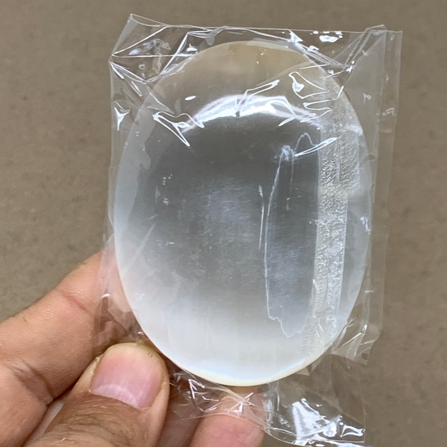 103g, 2.8"x2.1"x0.9", White Selenite Palmstone Crystal Pillow Reiki, B36434