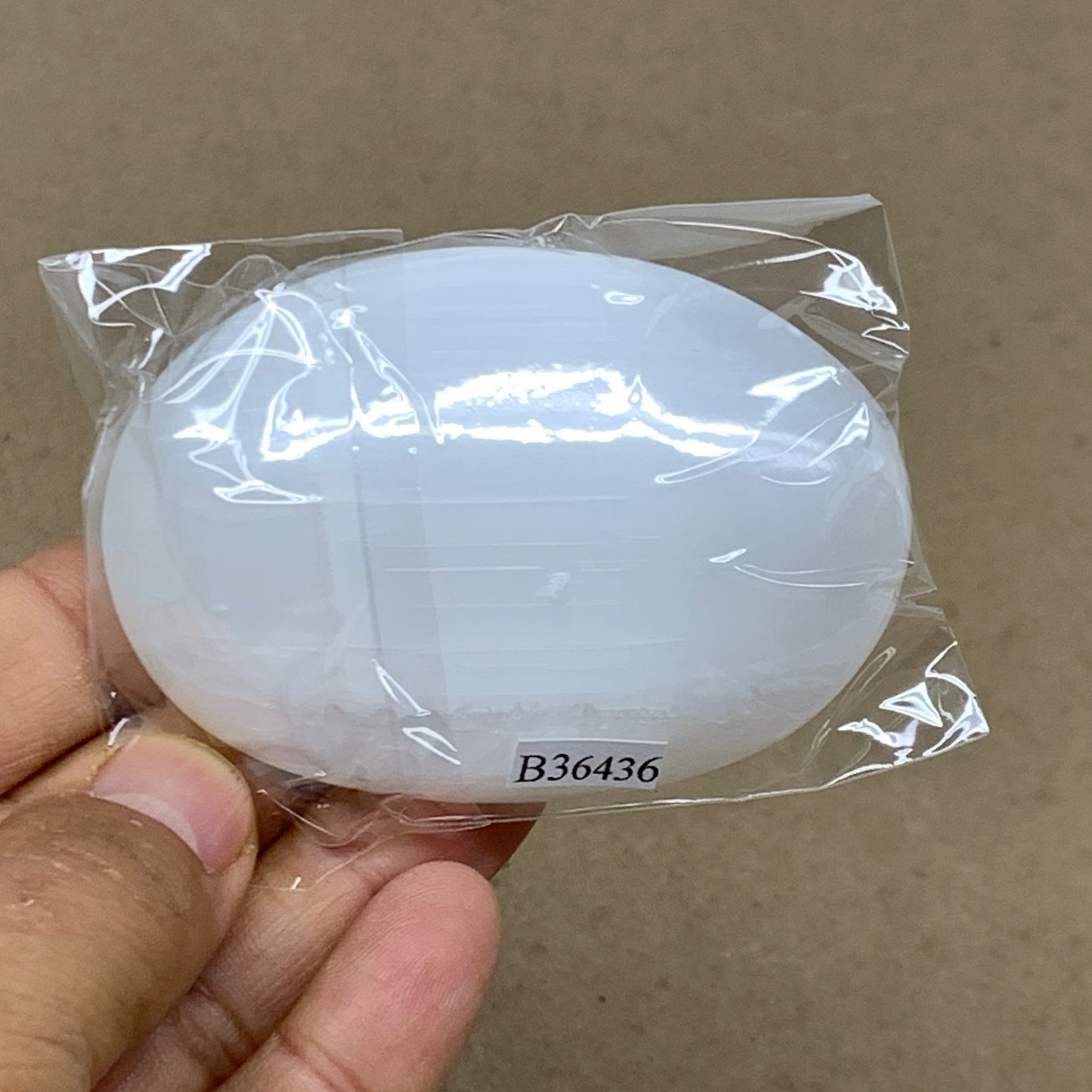 98g, 2.8"x1.9"x1", White Selenite Palmstone Crystal Pillow Reiki, B36436