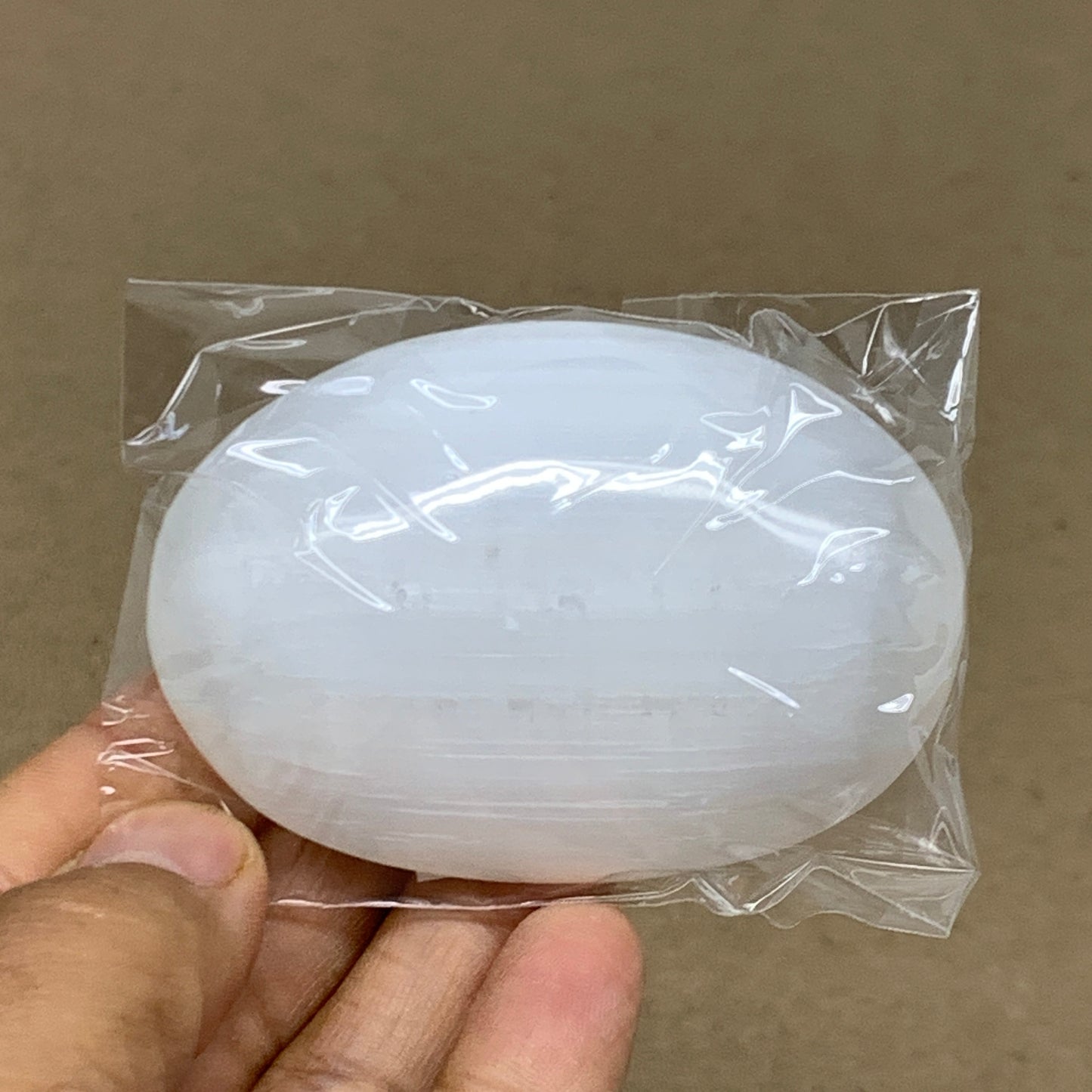 98g, 2.8"x1.9"x1", White Selenite Palmstone Crystal Pillow Reiki, B36436