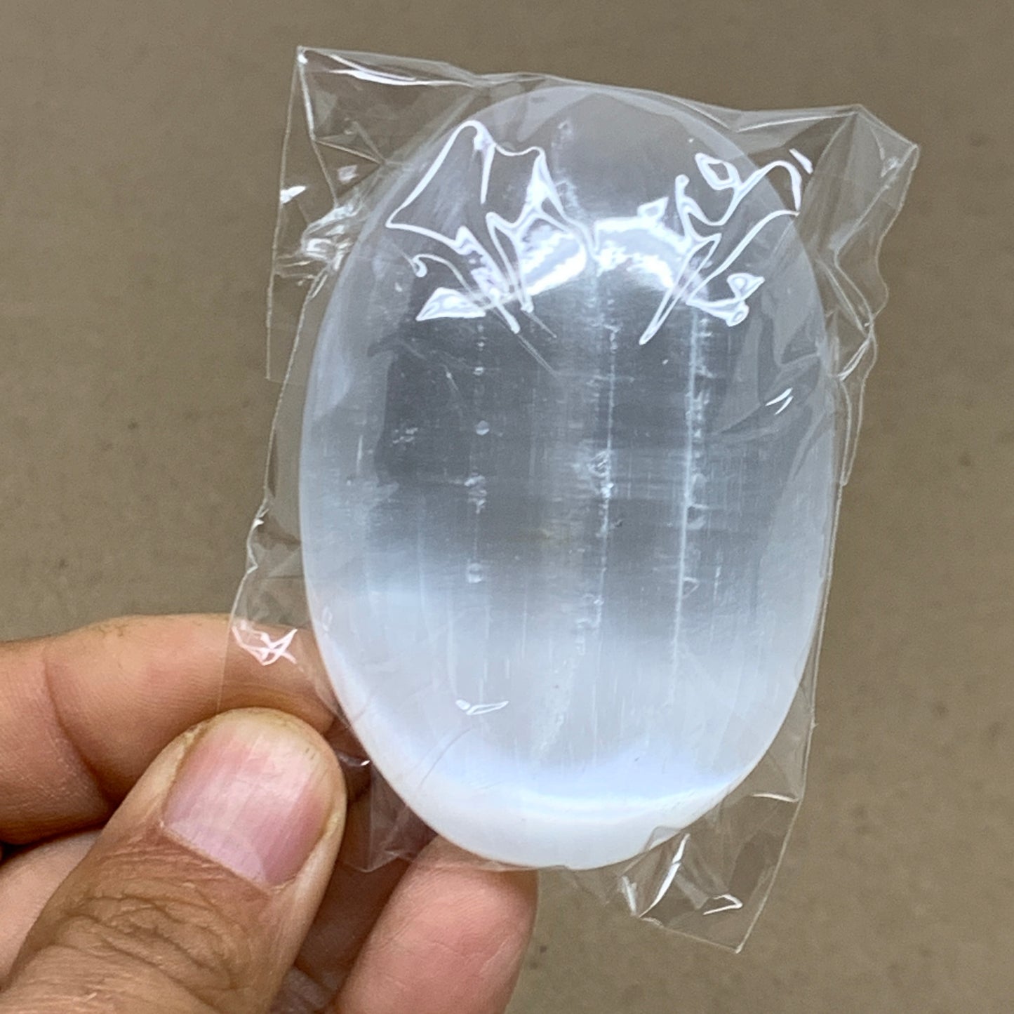 98g, 2.8"x1.9"x1", White Selenite Palmstone Crystal Pillow Reiki, B36436