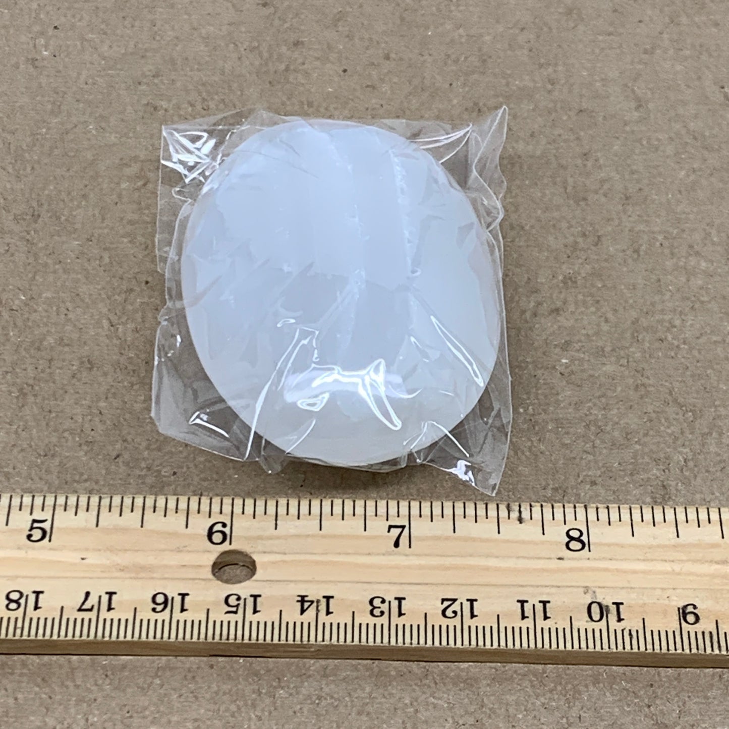98g, 2.8"x1.9"x1", White Selenite Palmstone Crystal Pillow Reiki, B36436