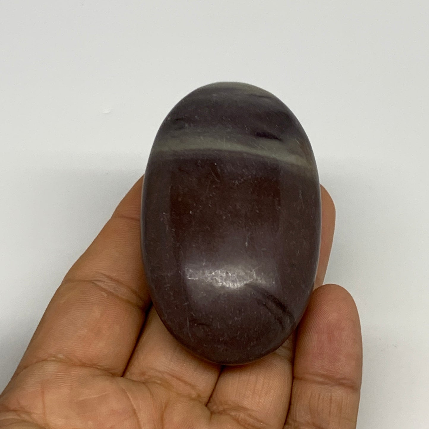 87.8g, 2.6"x1.6"x0.9", Narmada Shiva Lingam Palm-Stone Polished, B29386