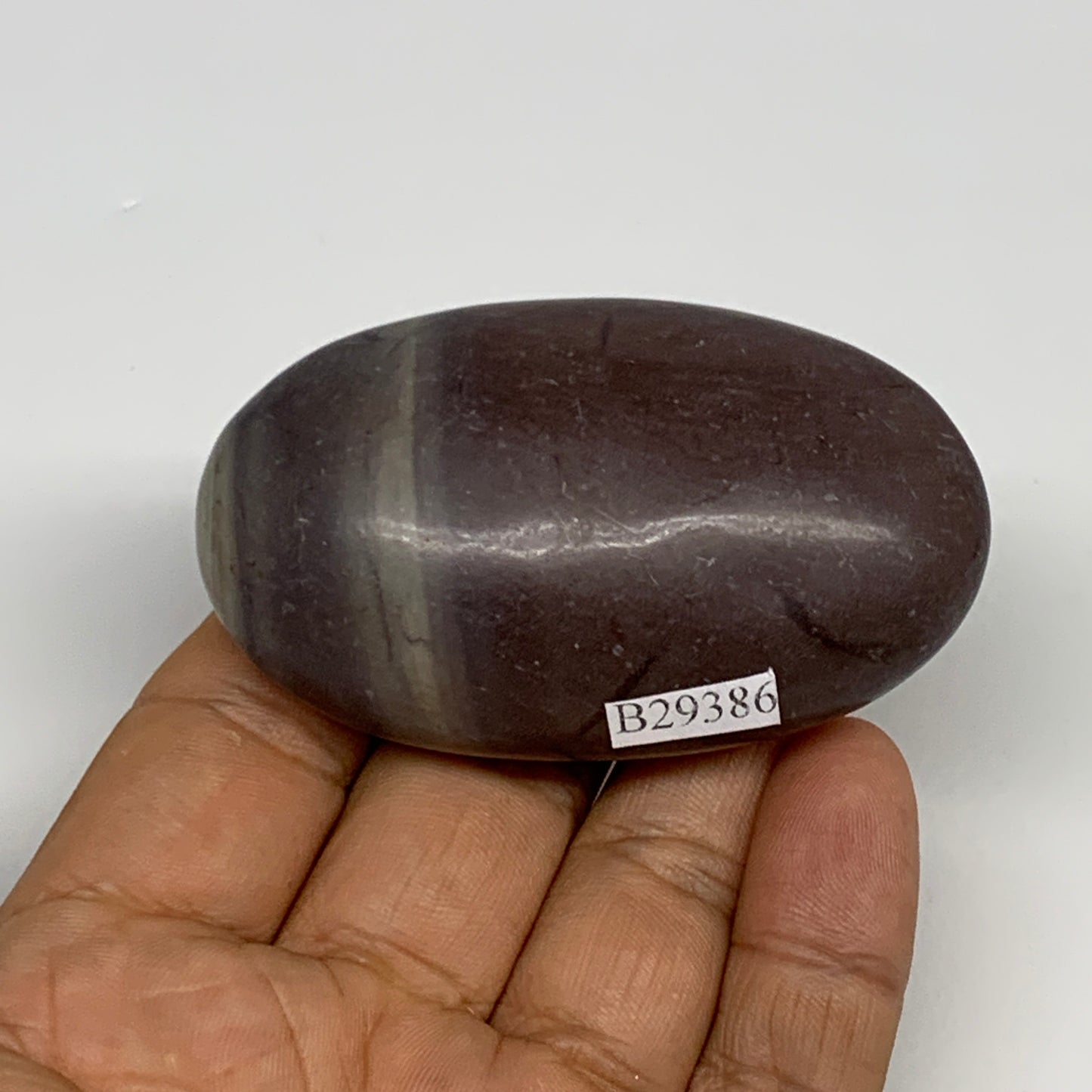 87.8g, 2.6"x1.6"x0.9", Narmada Shiva Lingam Palm-Stone Polished, B29386