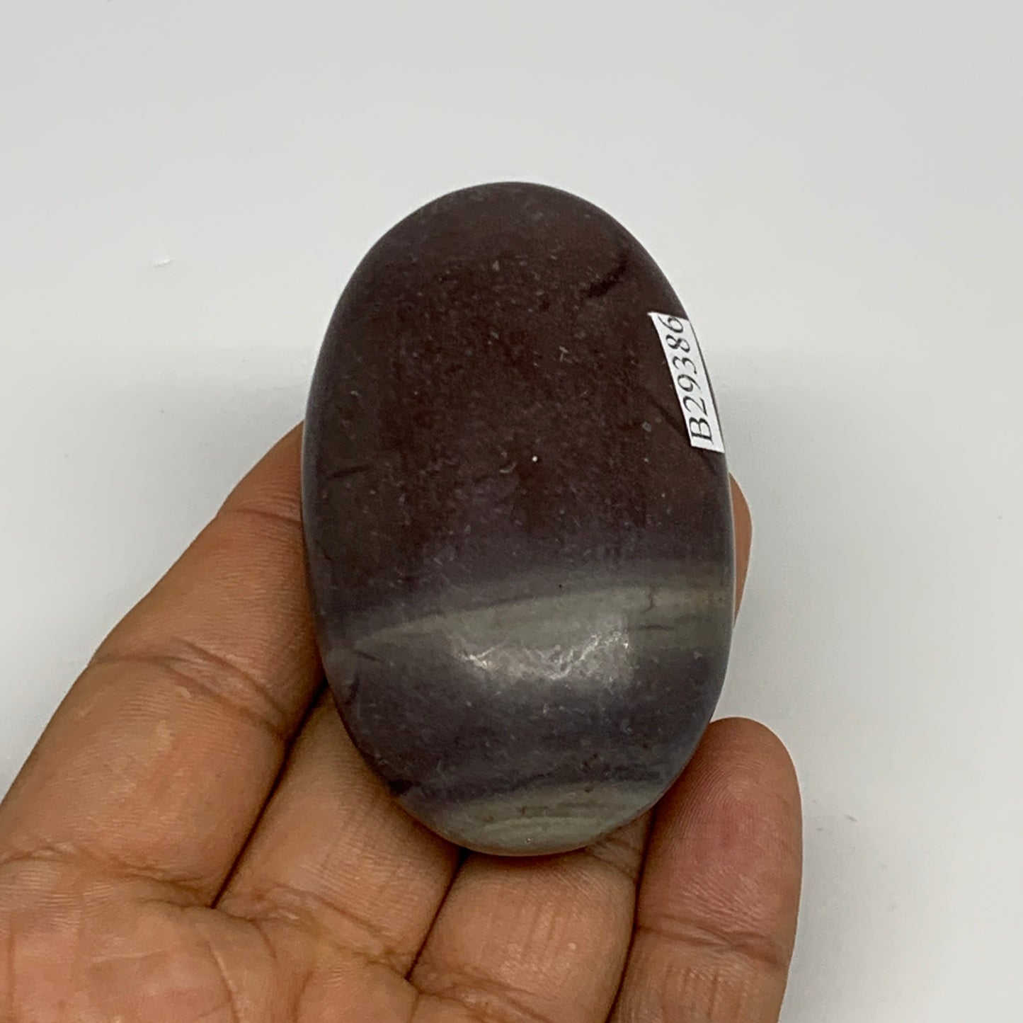 87.8g, 2.6"x1.6"x0.9", Narmada Shiva Lingam Palm-Stone Polished, B29386