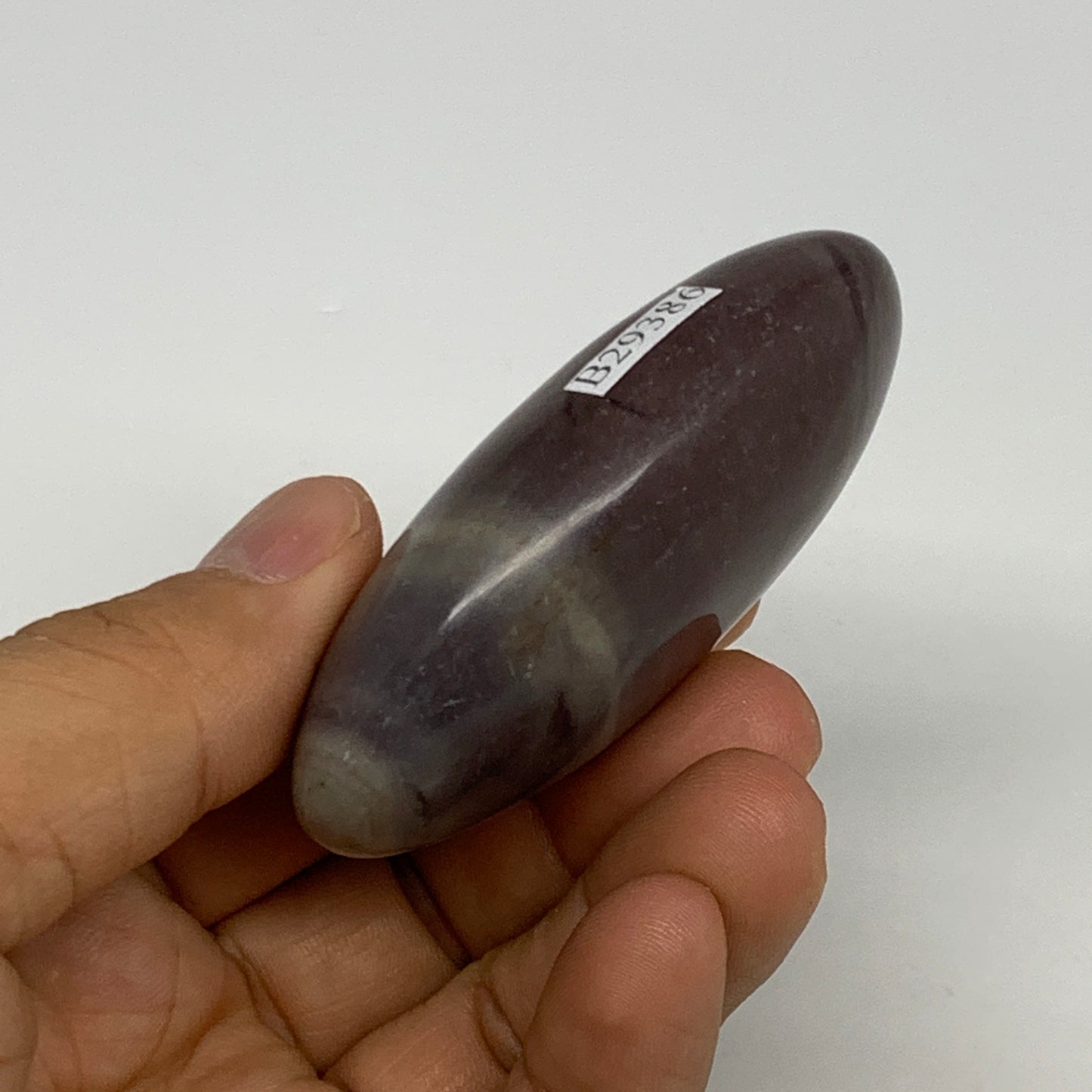 87.8g, 2.6"x1.6"x0.9", Narmada Shiva Lingam Palm-Stone Polished, B29386