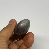 87.8g, 2.6"x1.6"x0.9", Narmada Shiva Lingam Palm-Stone Polished, B29386