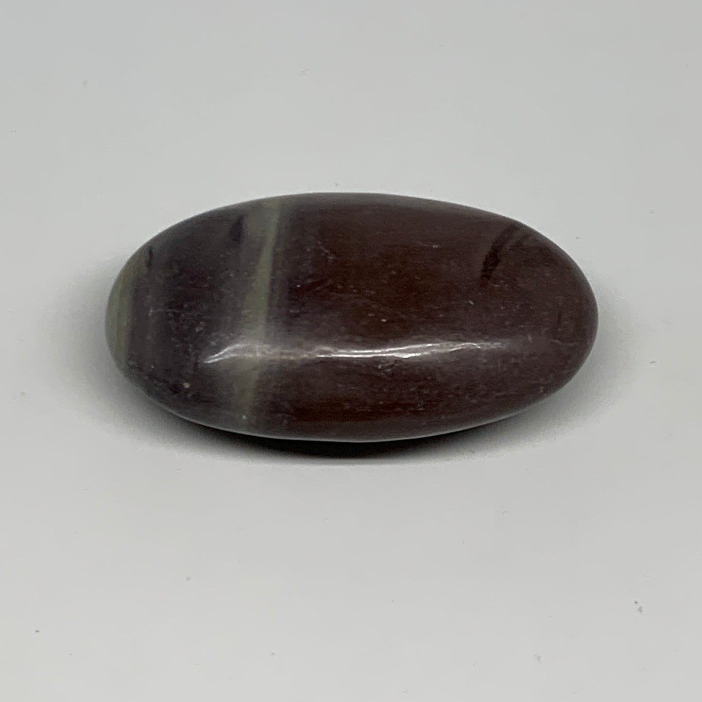 87.8g, 2.6"x1.6"x0.9", Narmada Shiva Lingam Palm-Stone Polished, B29386
