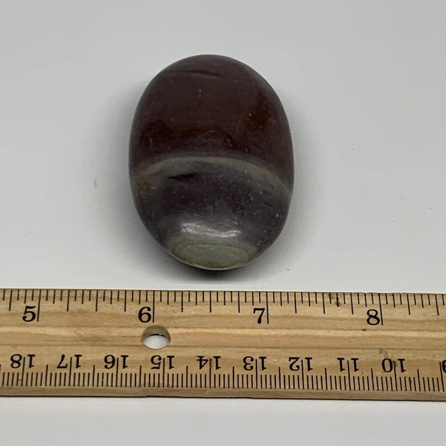 87.8g, 2.6"x1.6"x0.9", Narmada Shiva Lingam Palm-Stone Polished, B29386