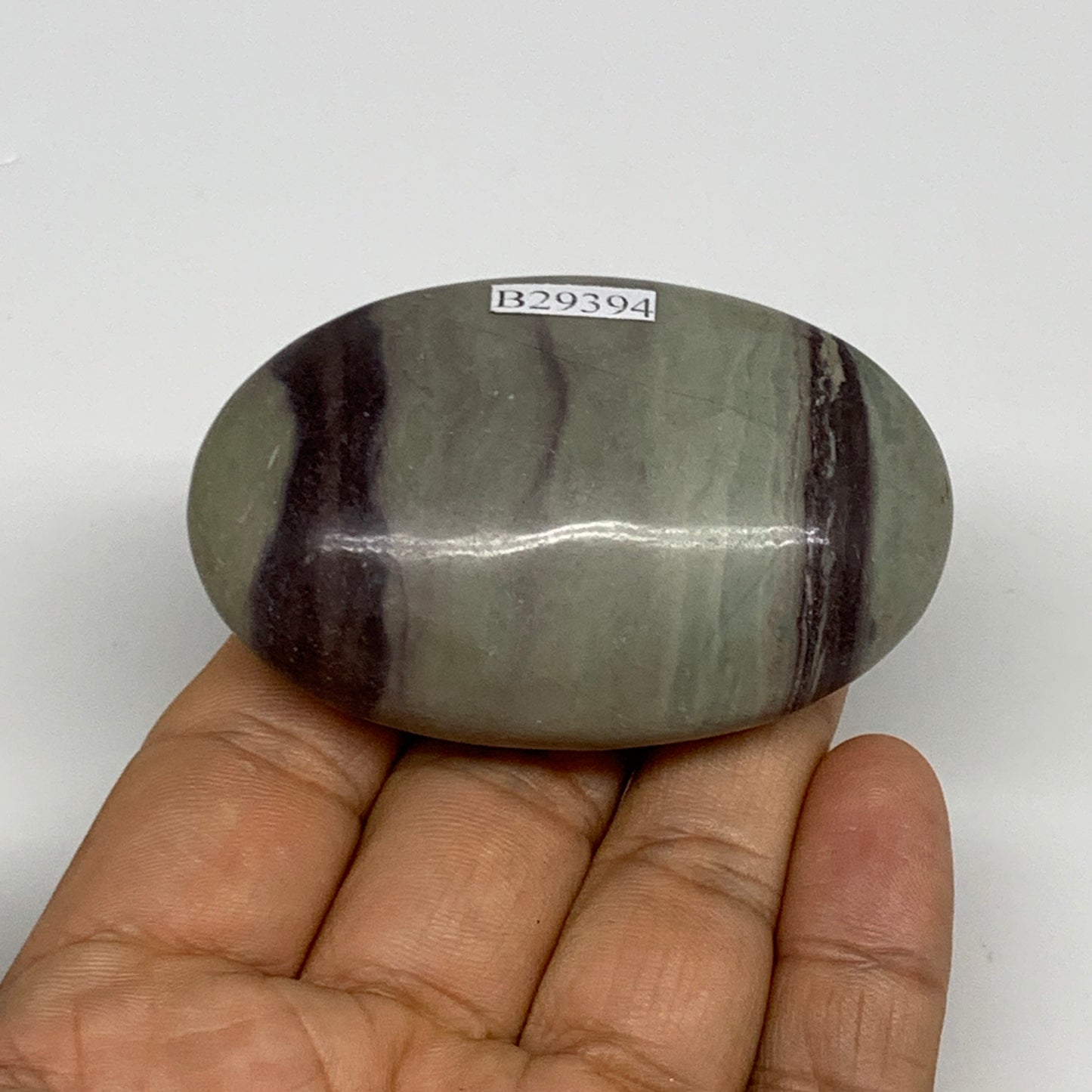 86.3g, 2.5"x1.6"x0.9", Narmada Shiva Lingam Palm-Stone Polished, B29394