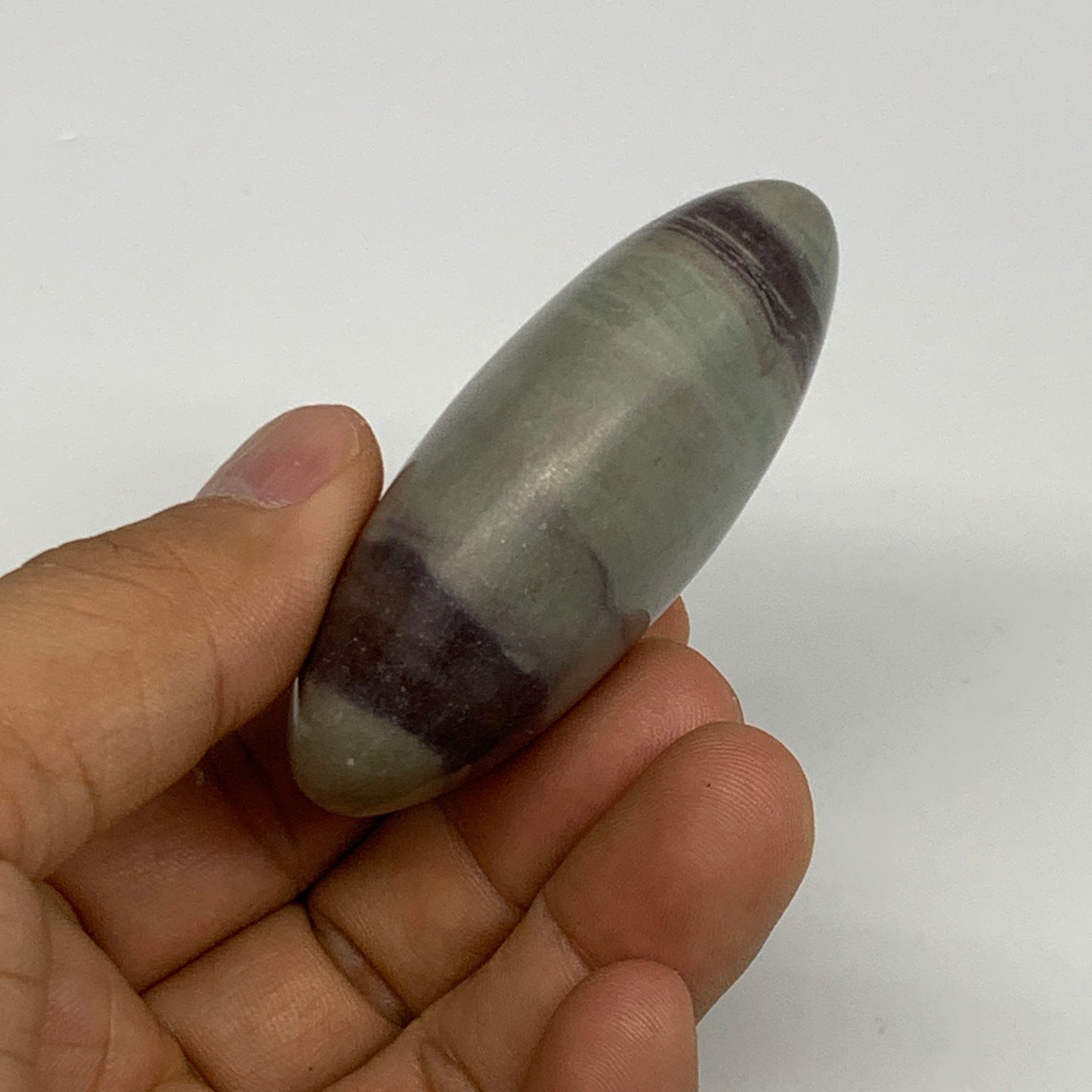 86.3g, 2.5"x1.6"x0.9", Narmada Shiva Lingam Palm-Stone Polished, B29394