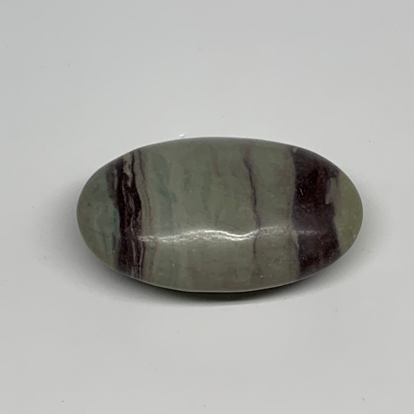 86.3g, 2.5"x1.6"x0.9", Narmada Shiva Lingam Palm-Stone Polished, B29394