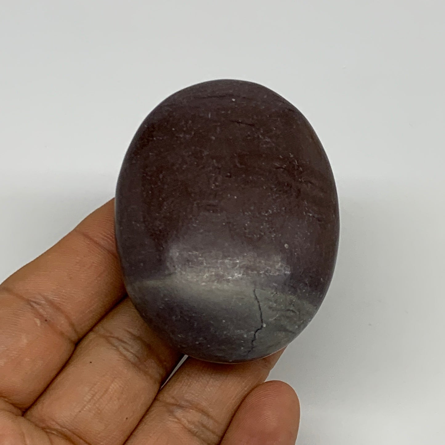88.3g, 2.4"x1.8"x0.9", Narmada Shiva Lingam Palm-Stone Polished, B29398