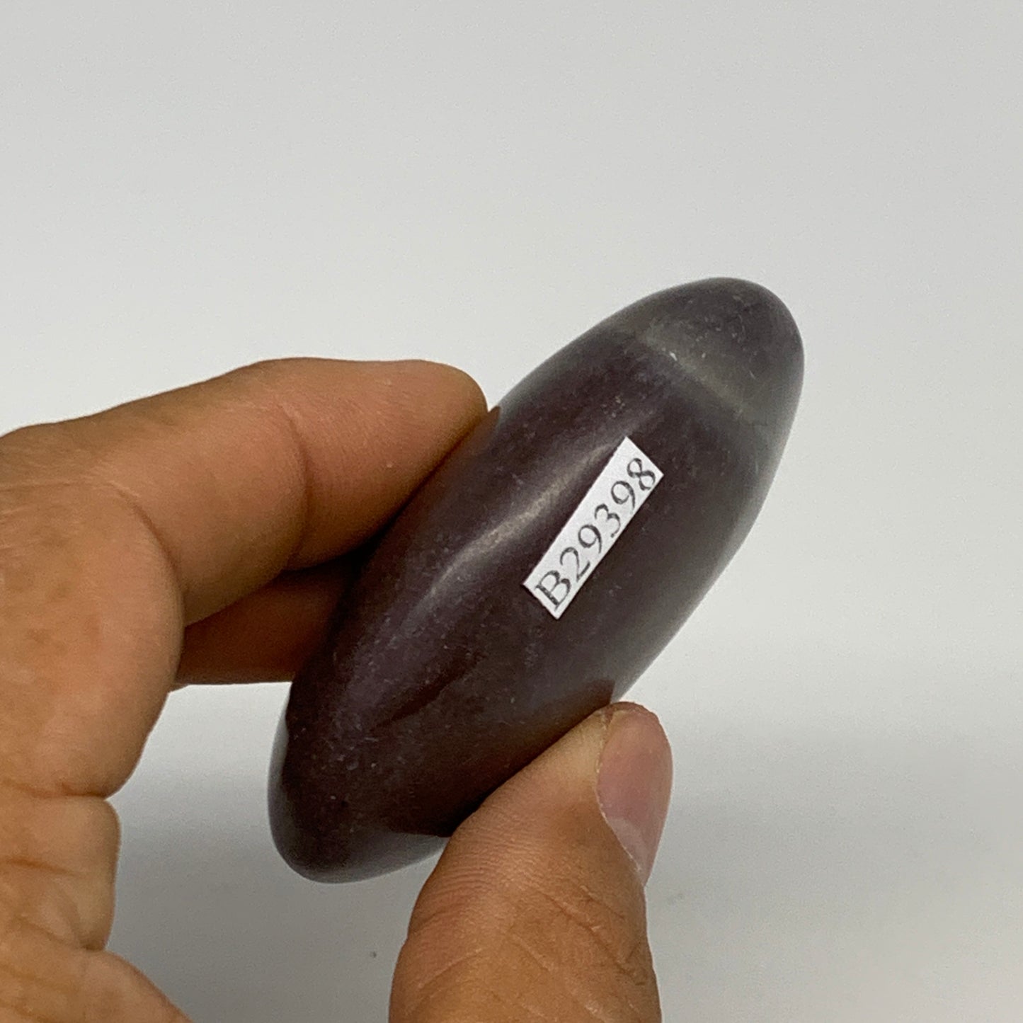 88.3g, 2.4"x1.8"x0.9", Narmada Shiva Lingam Palm-Stone Polished, B29398