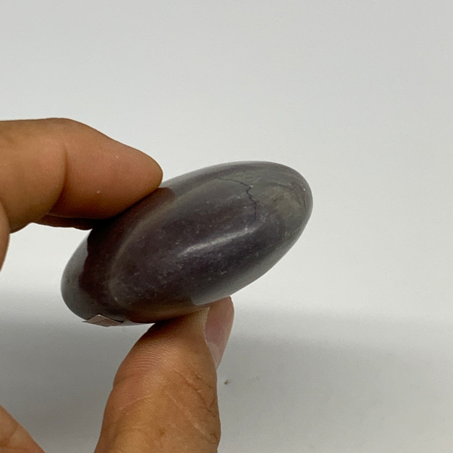 88.3g, 2.4"x1.8"x0.9", Narmada Shiva Lingam Palm-Stone Polished, B29398