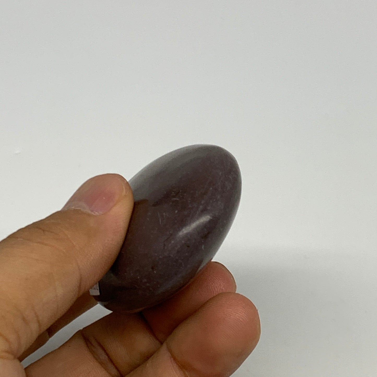 88.3g, 2.4"x1.8"x0.9", Narmada Shiva Lingam Palm-Stone Polished, B29398
