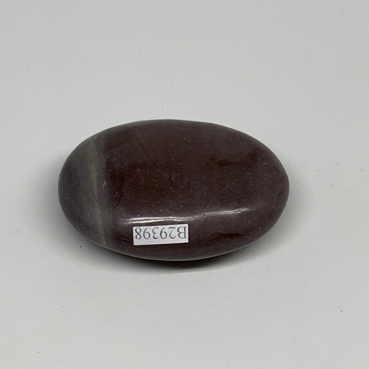 88.3g, 2.4"x1.8"x0.9", Narmada Shiva Lingam Palm-Stone Polished, B29398