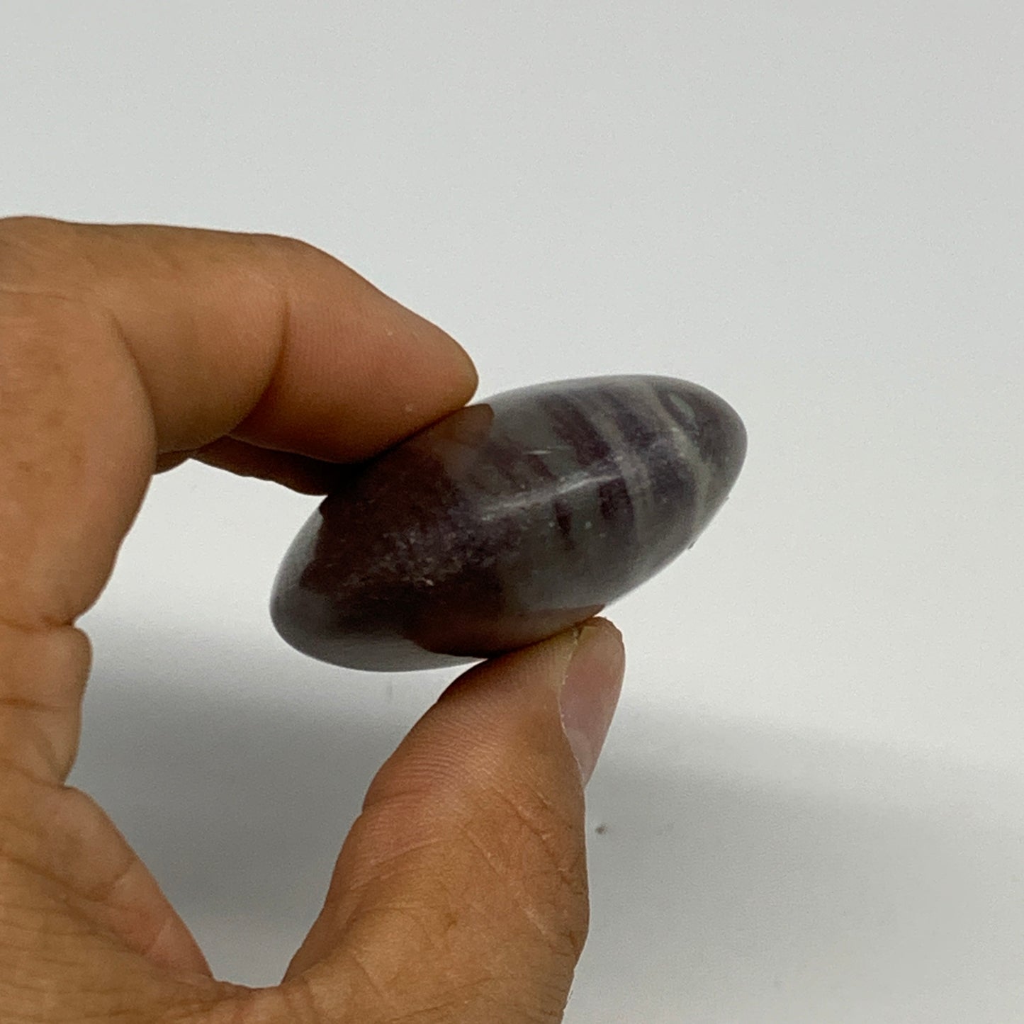 76.6g, 2.5"x1.6"x0.8", Narmada Shiva Lingam Palm-Stone Polished, B29399